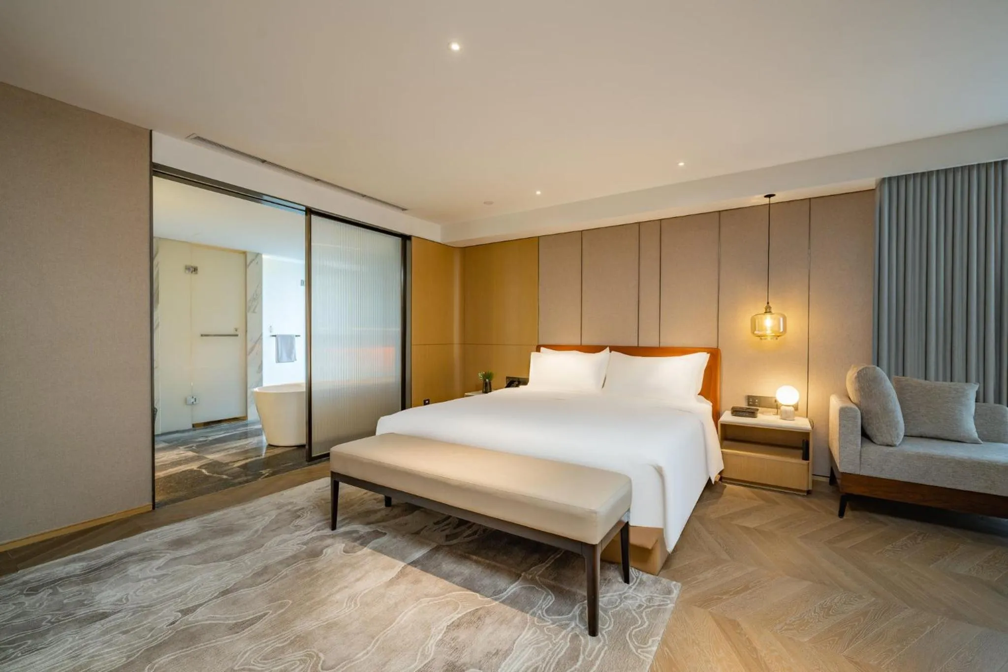 Photo of the whole room, Bed in Holiday Inn Shanghai Huaxia by IHG - overlooking city scenery at Sky View Restaurant