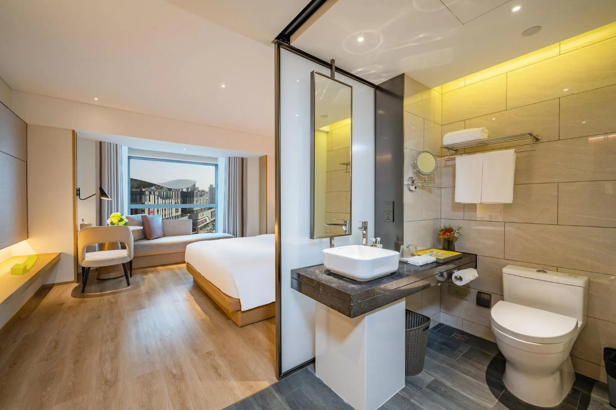 Bathroom in Holiday Inn Shanghai Huaxia by IHG - overlooking city scenery at Sky View Restaurant
