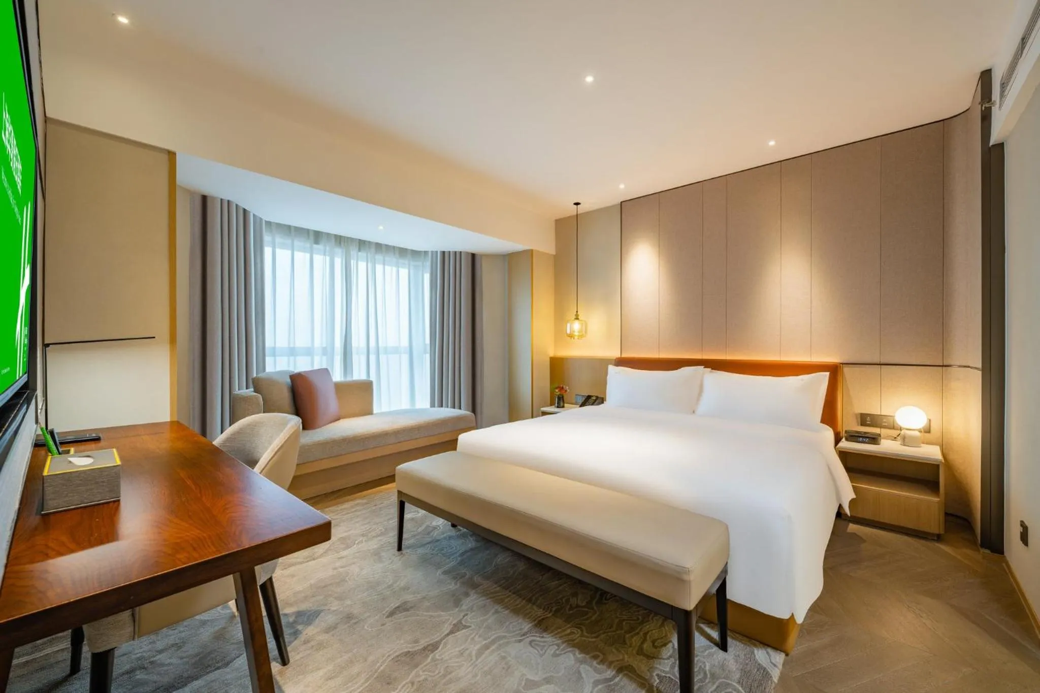 Photo of the whole room, Bed in Holiday Inn Shanghai Huaxia by IHG - overlooking city scenery at Sky View Restaurant