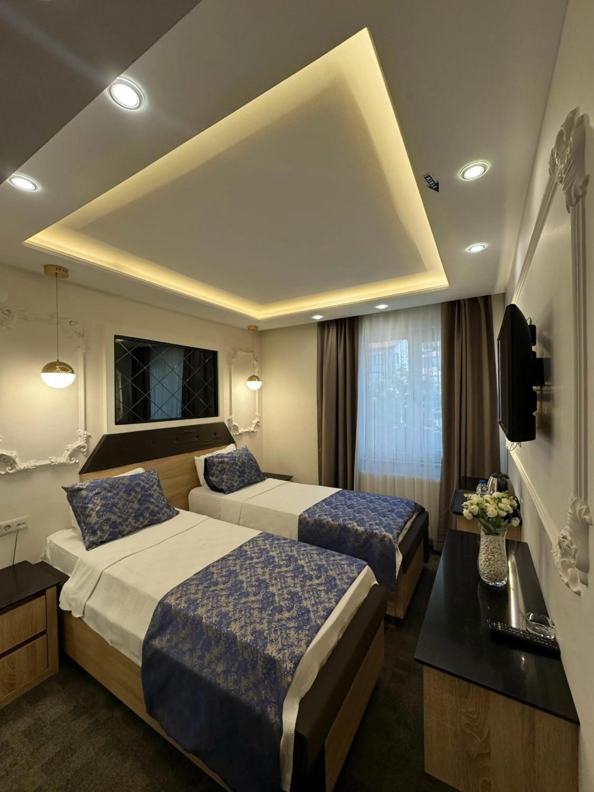 Bed in AYDINLI HOTEL