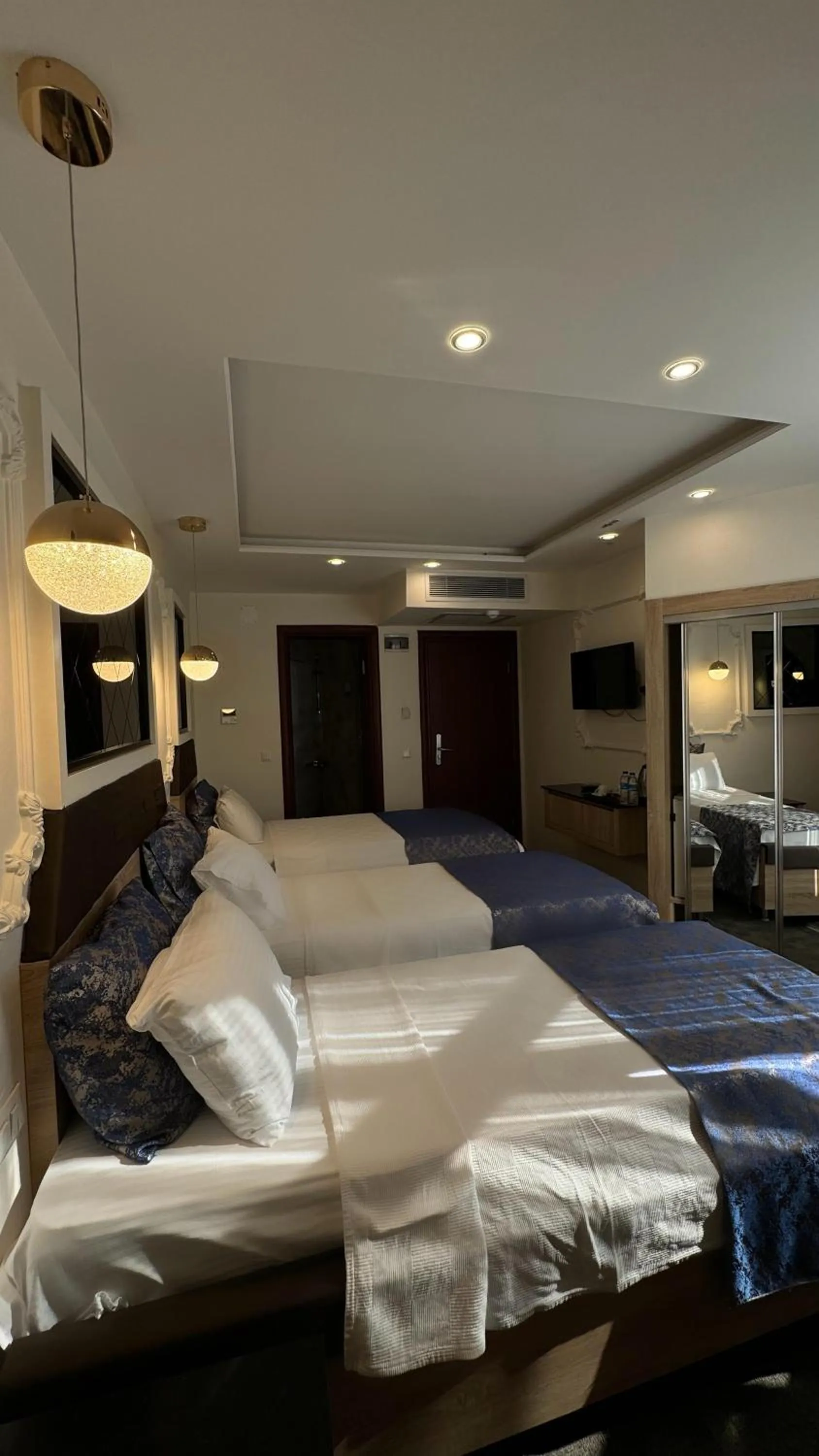 Bed in AYDINLI HOTEL