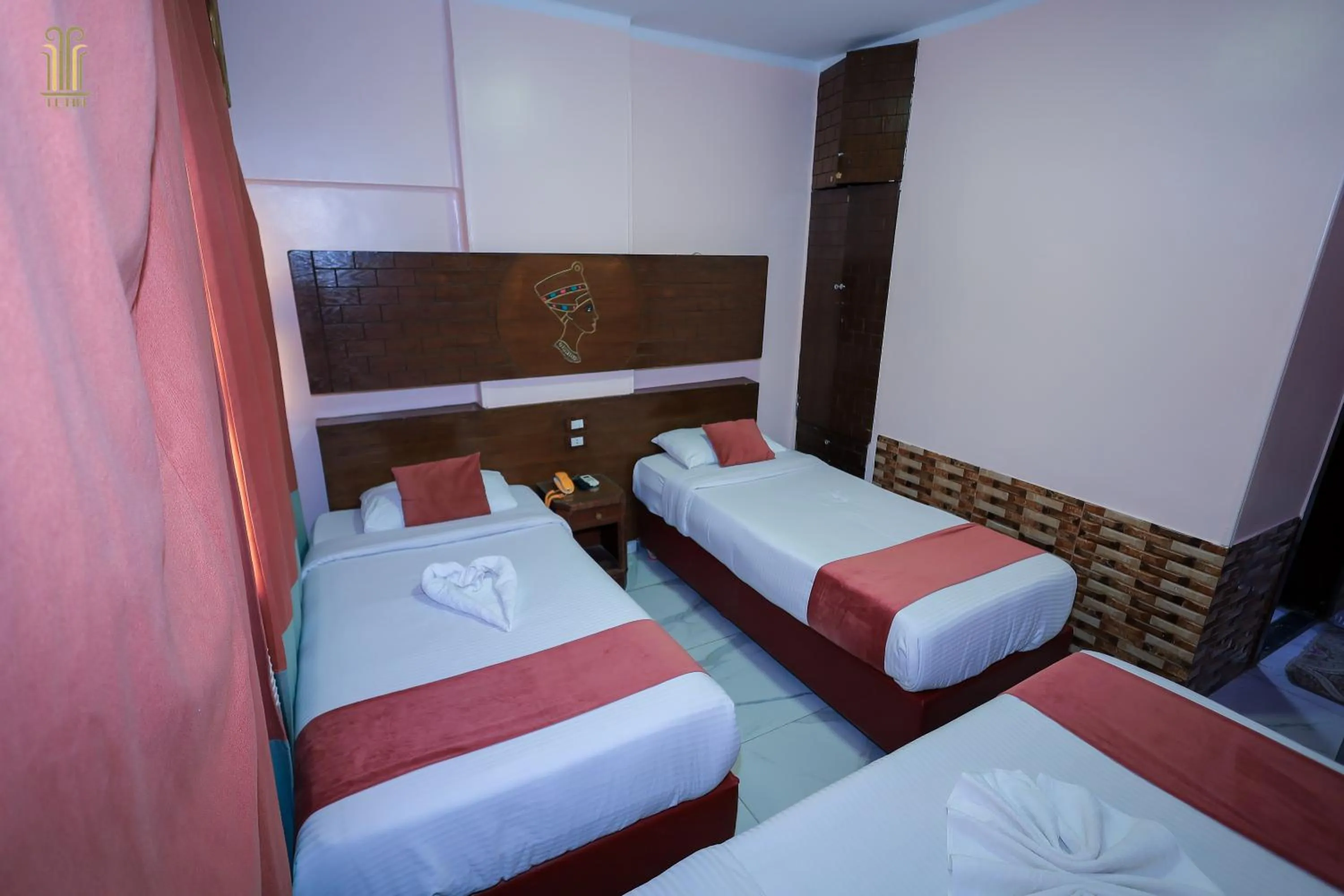 Bed in Tiba Hotel