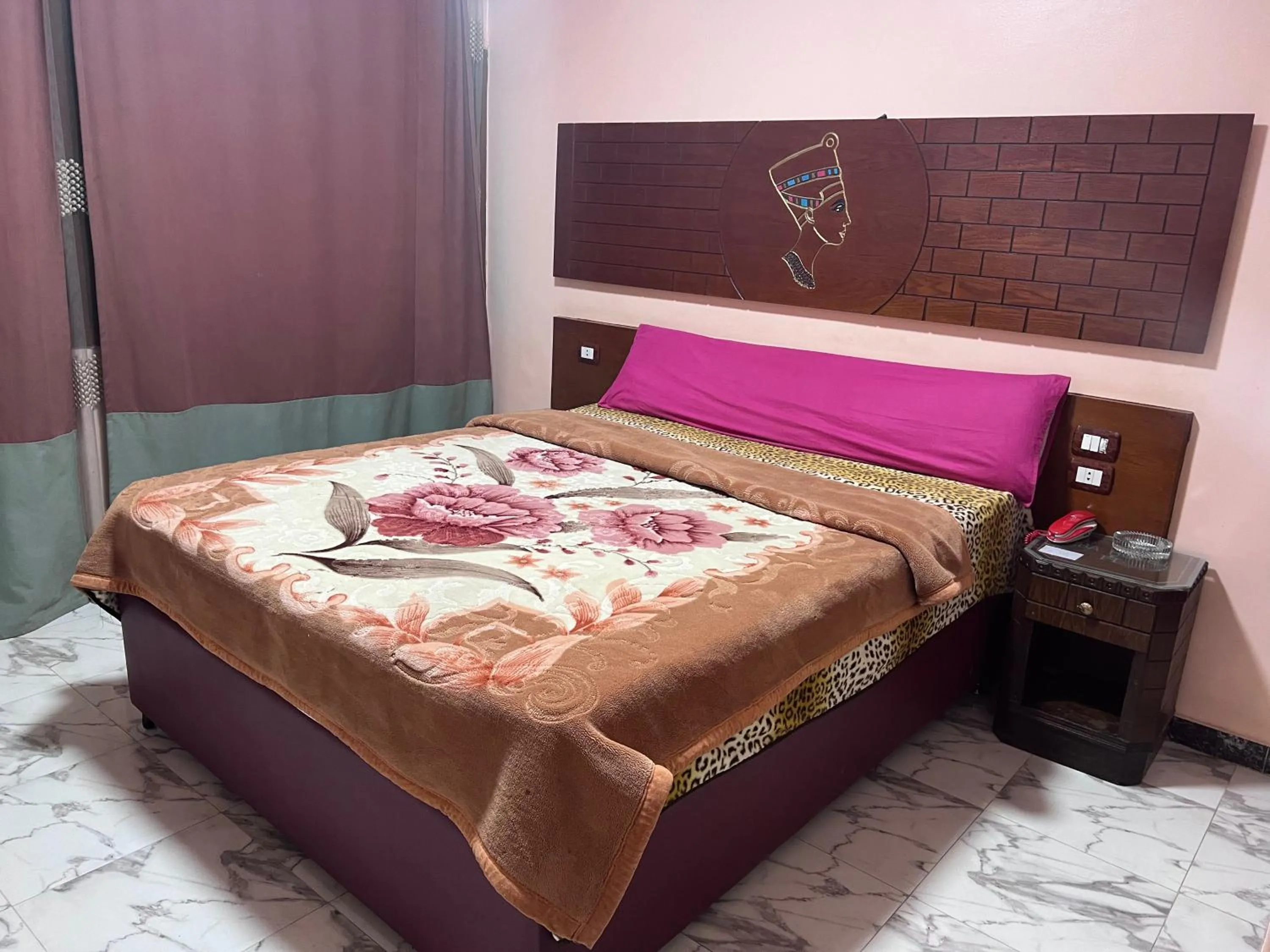 Bed in Tiba Hotel