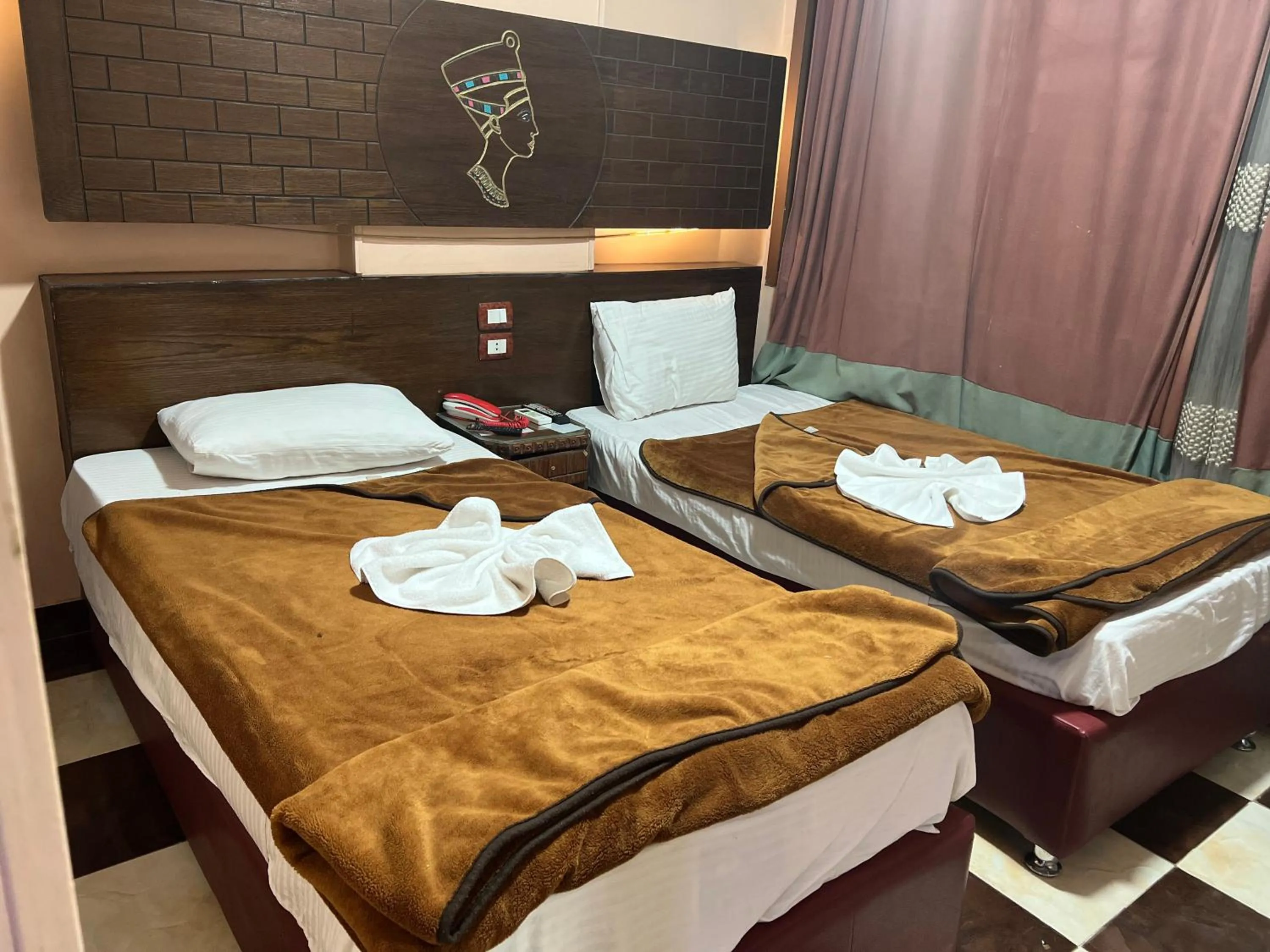 Bed in Tiba Hotel