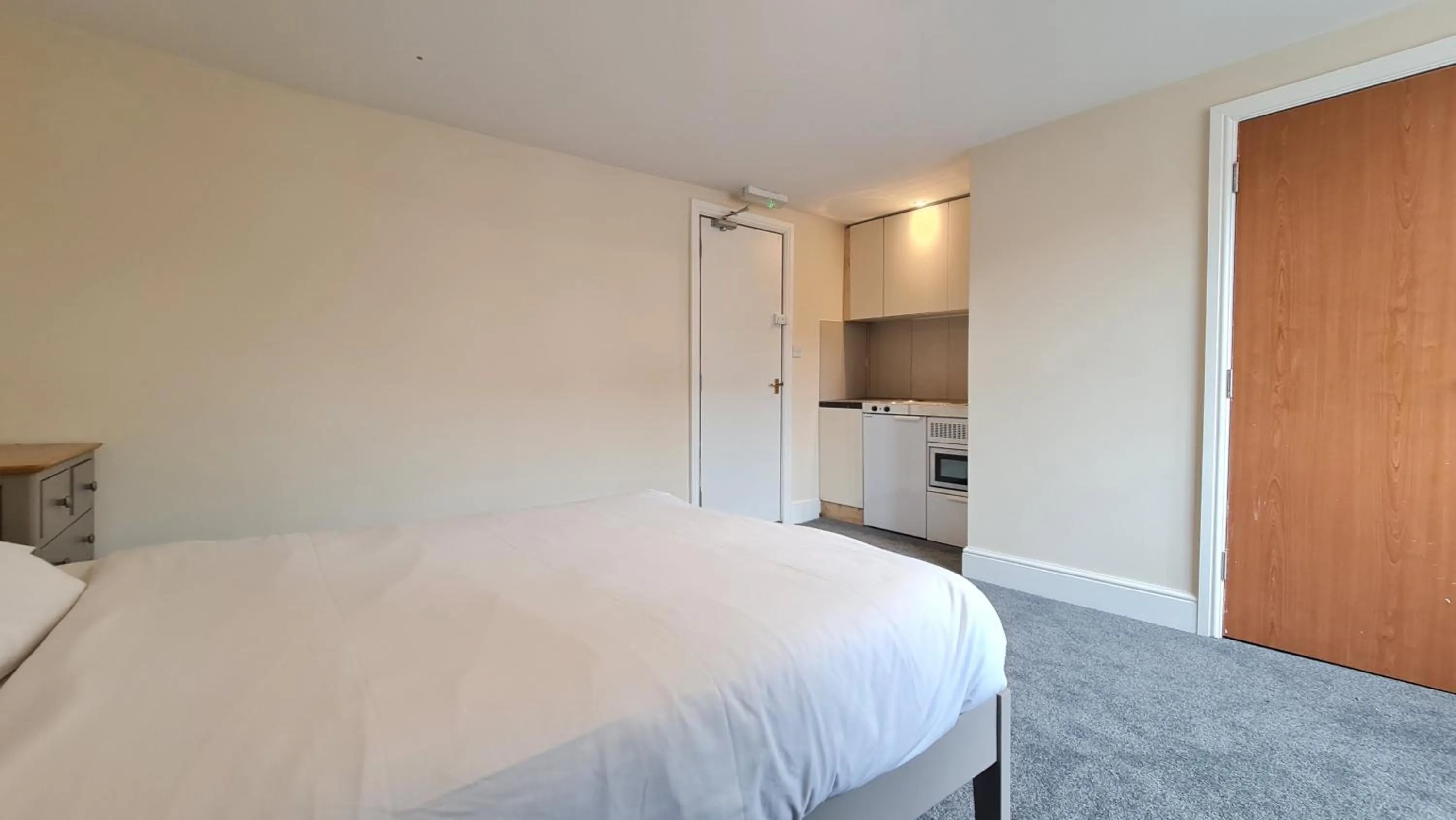 Bedroom, Bed in Grace Apartments - Living Rock