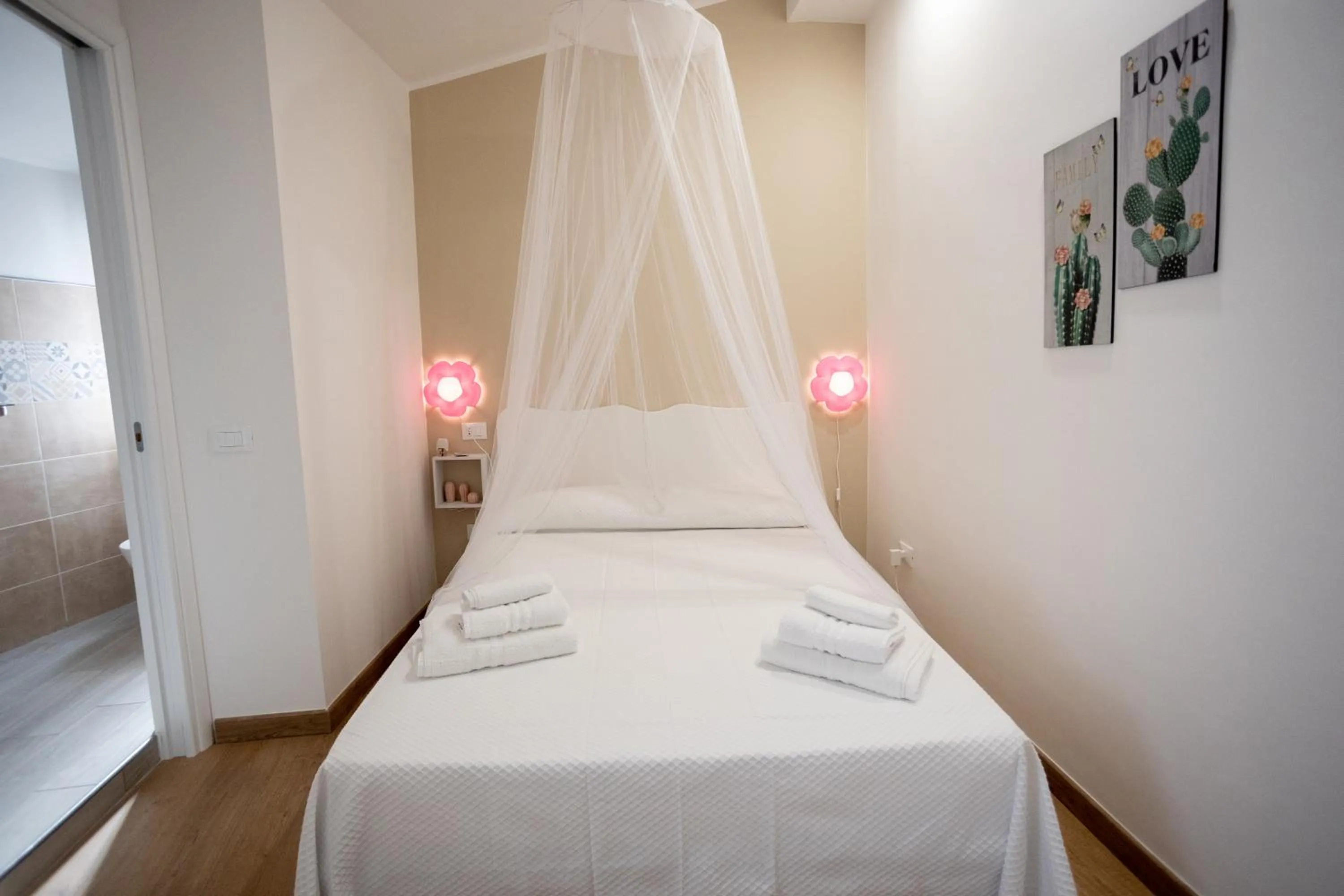 Bed in EXCLUSIVE ROOMS Al Vicoletto