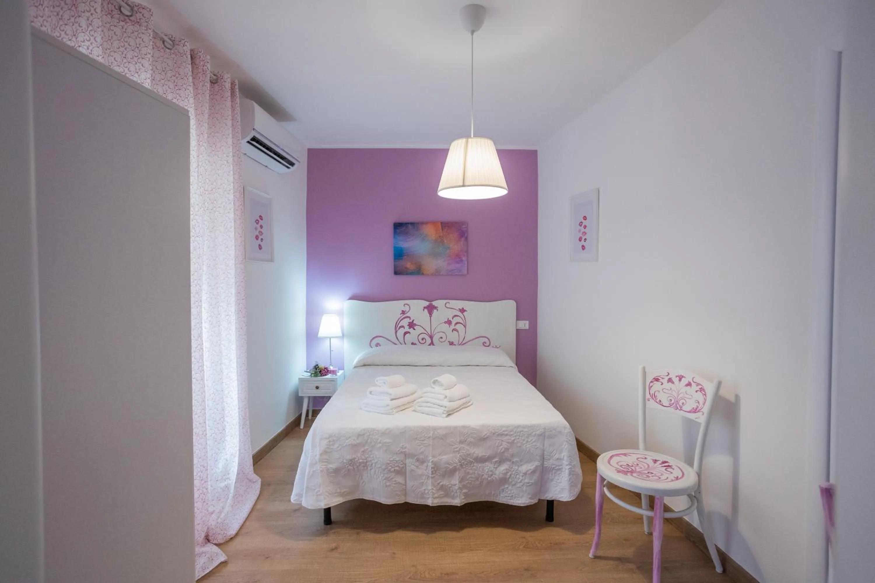 Bed in EXCLUSIVE ROOMS Al Vicoletto