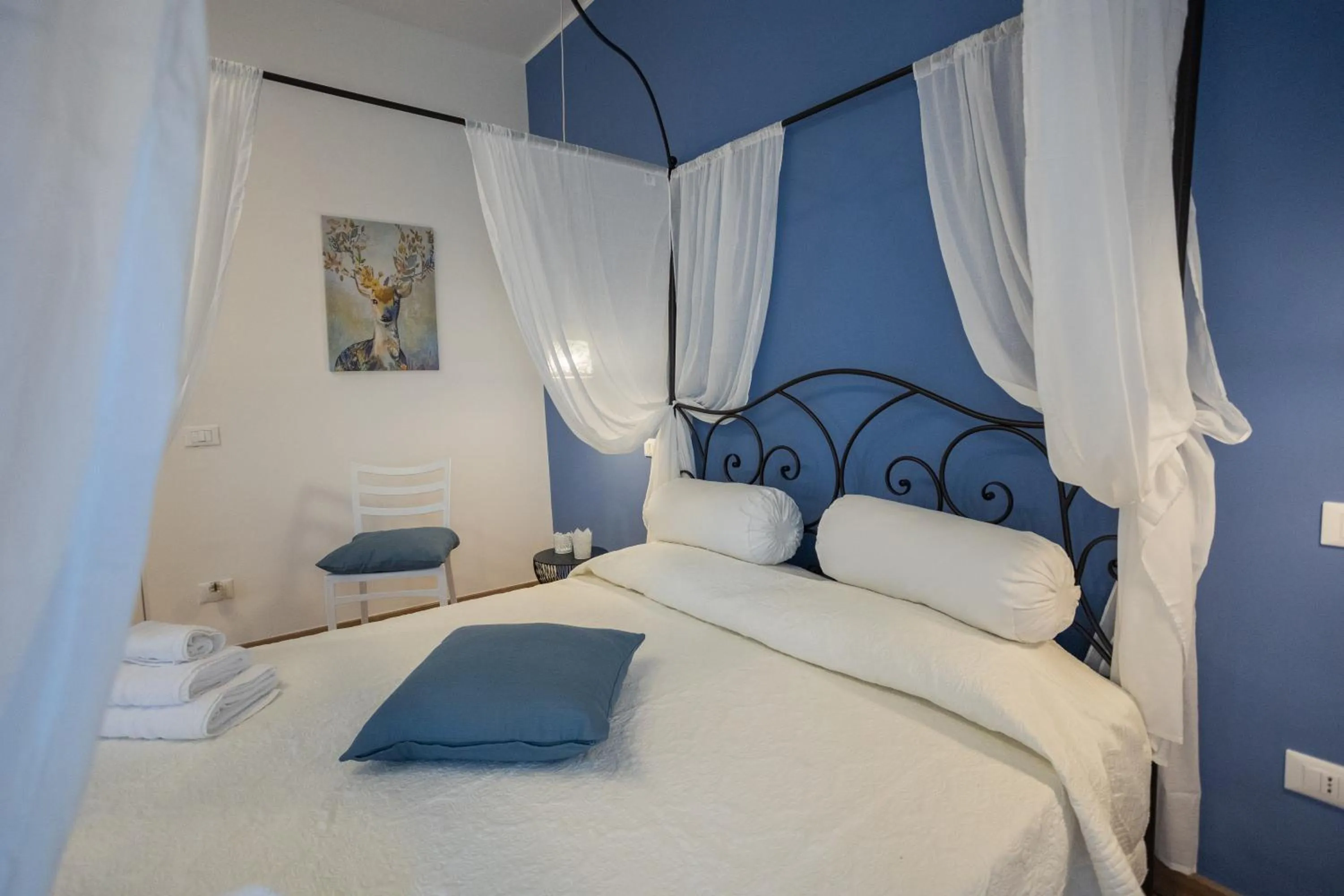 Bed in EXCLUSIVE ROOMS Al Vicoletto