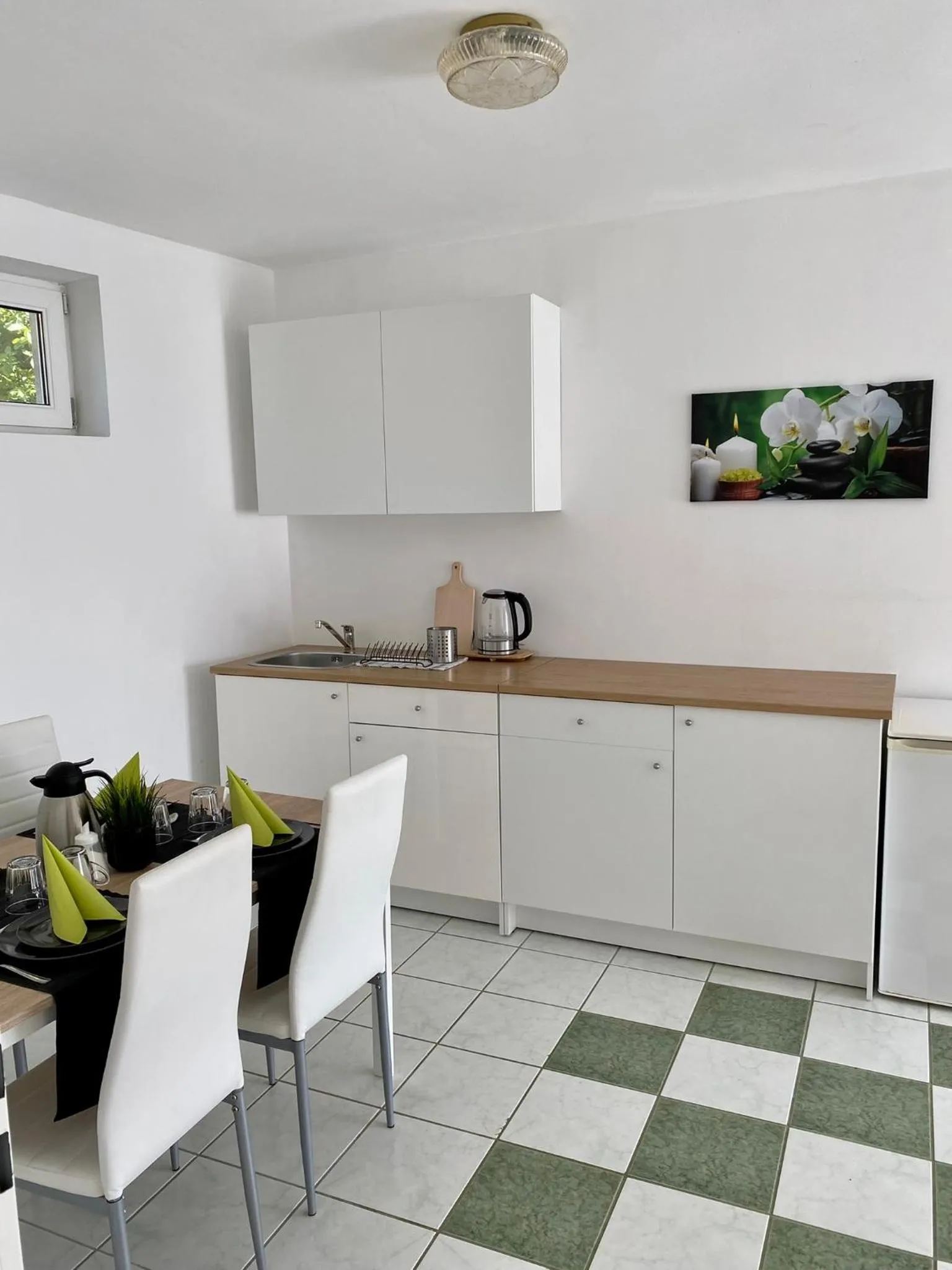 Kitchen or kitchenette in Appartementhaus 5. Jahreszeit