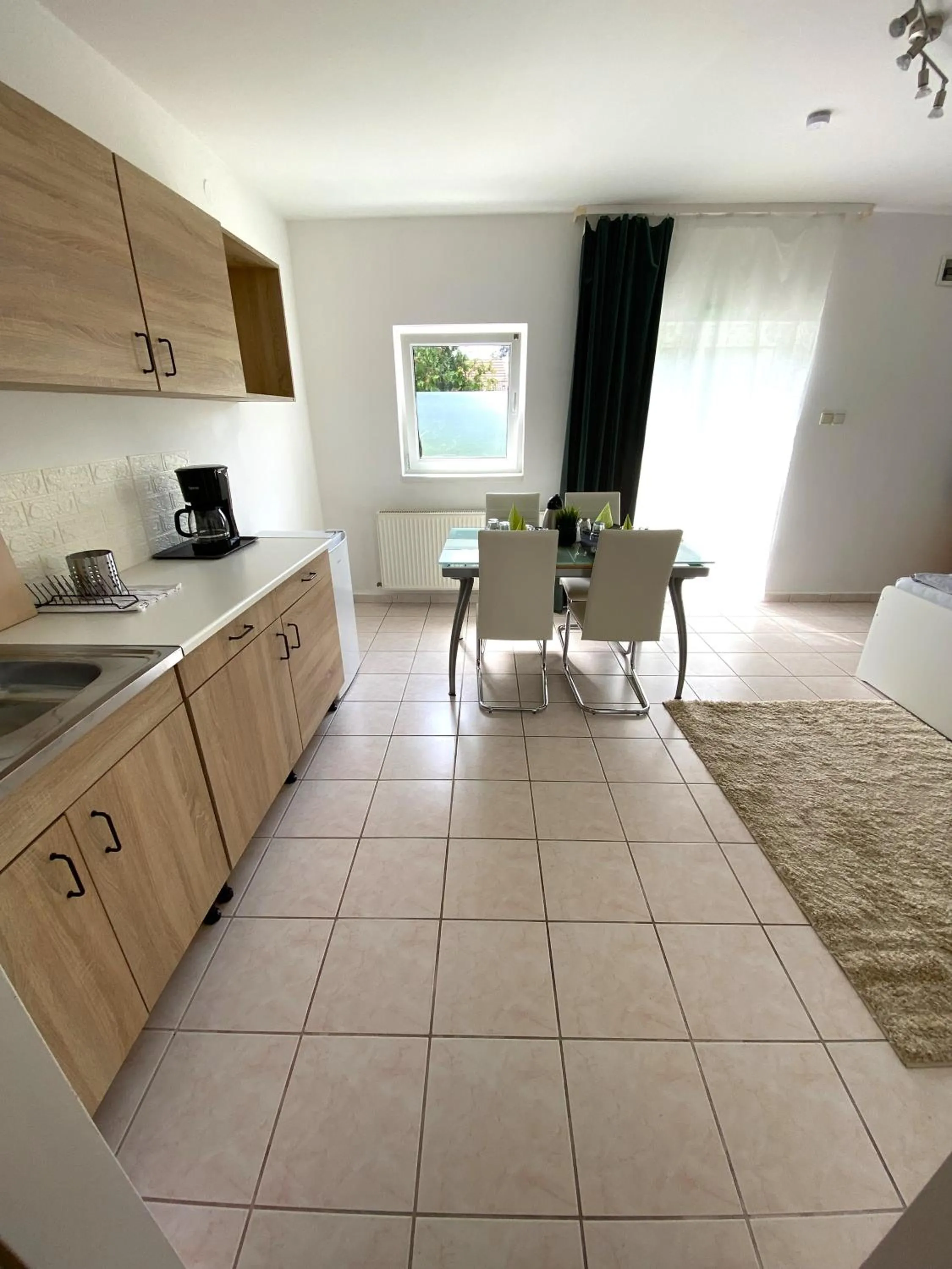 Kitchen or kitchenette in Appartementhaus 5. Jahreszeit