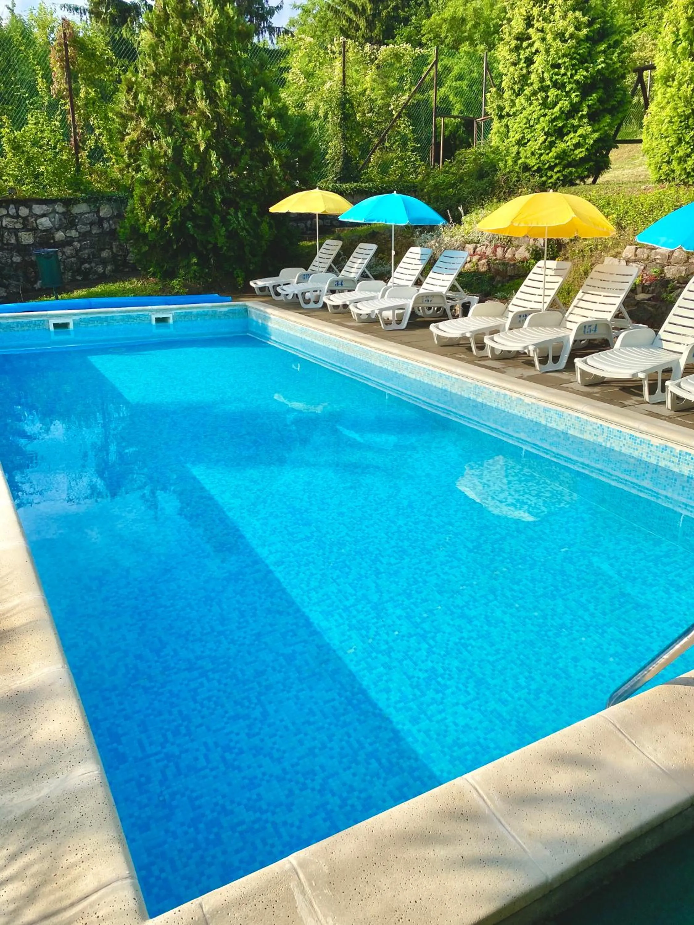 Swimming pool in Appartementhaus 5. Jahreszeit
