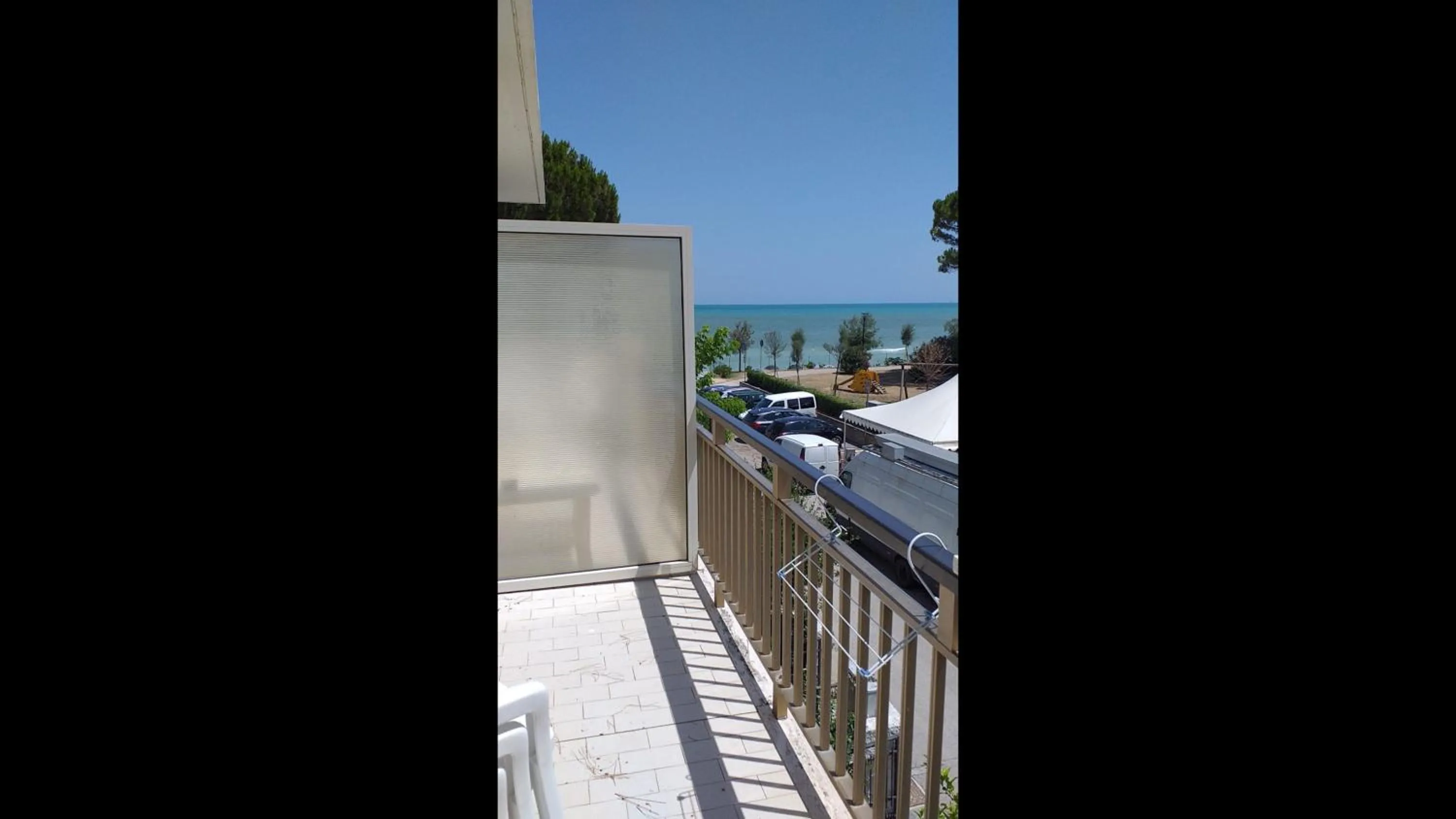 View (from property/room) in Spacious quadruple room a stone throw from the sea