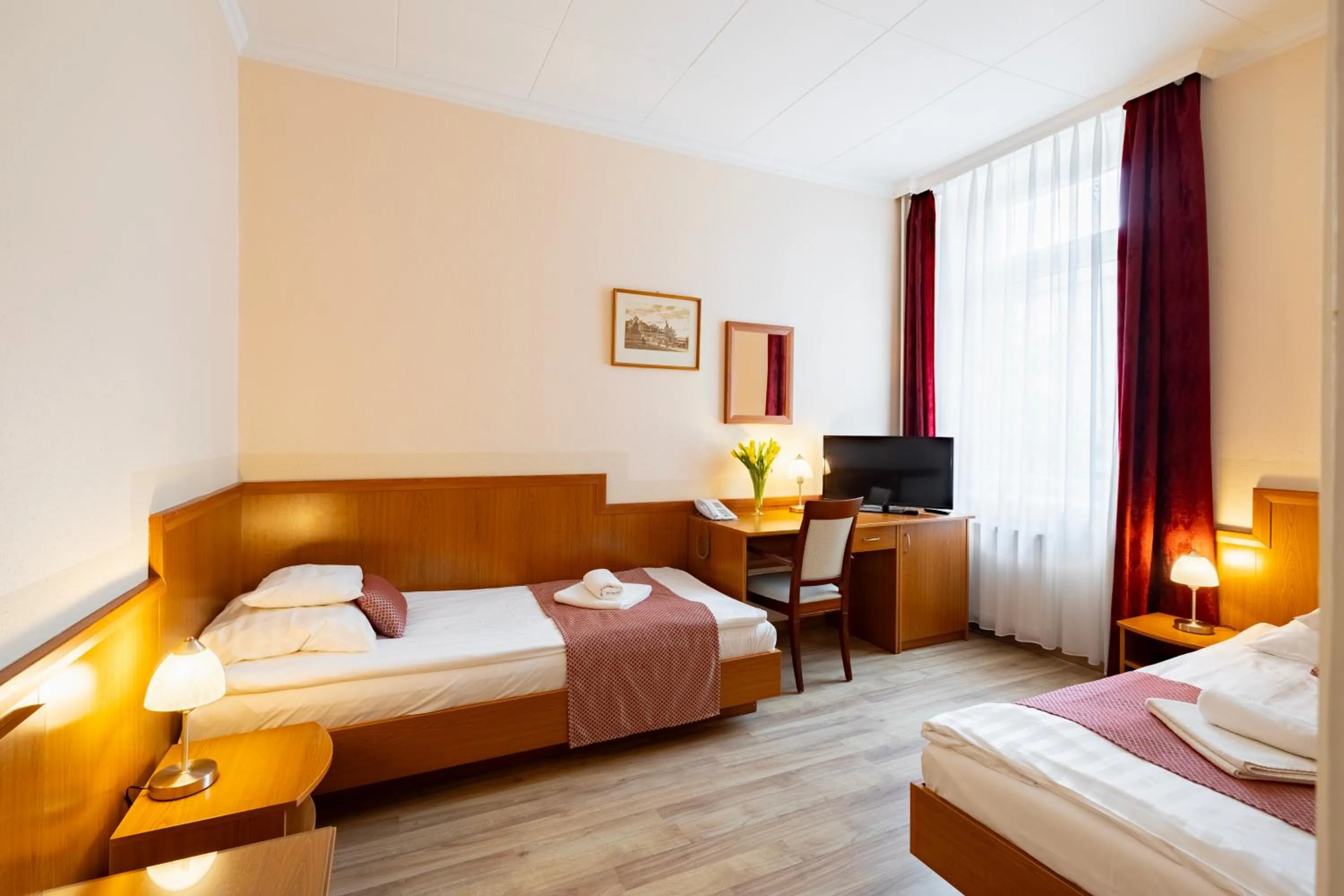 Bed in Hotel Pannonia