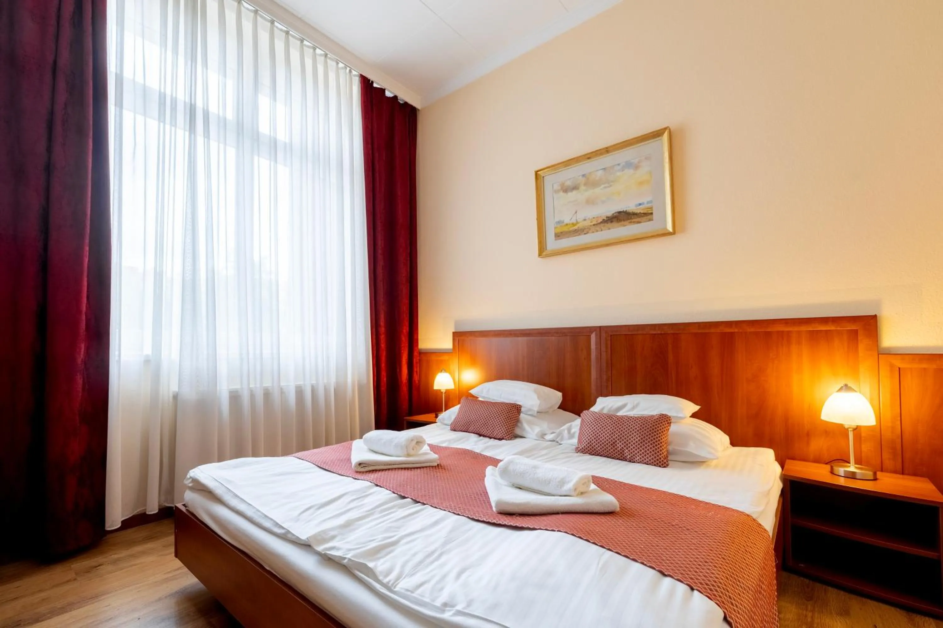 Bed in Hotel Pannonia