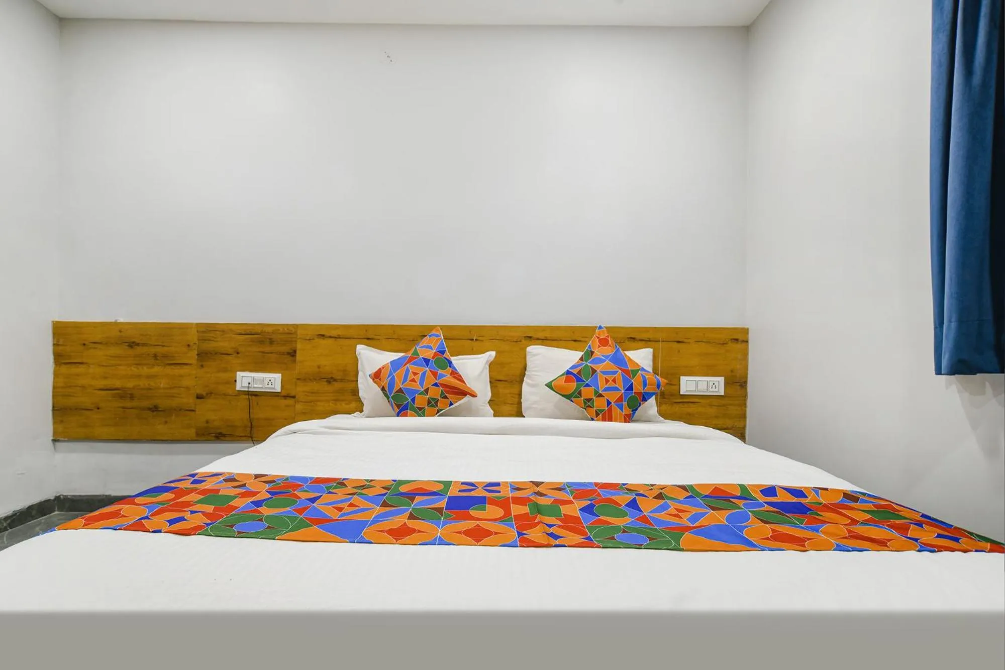 Bed in FabHotel Unity Landmark