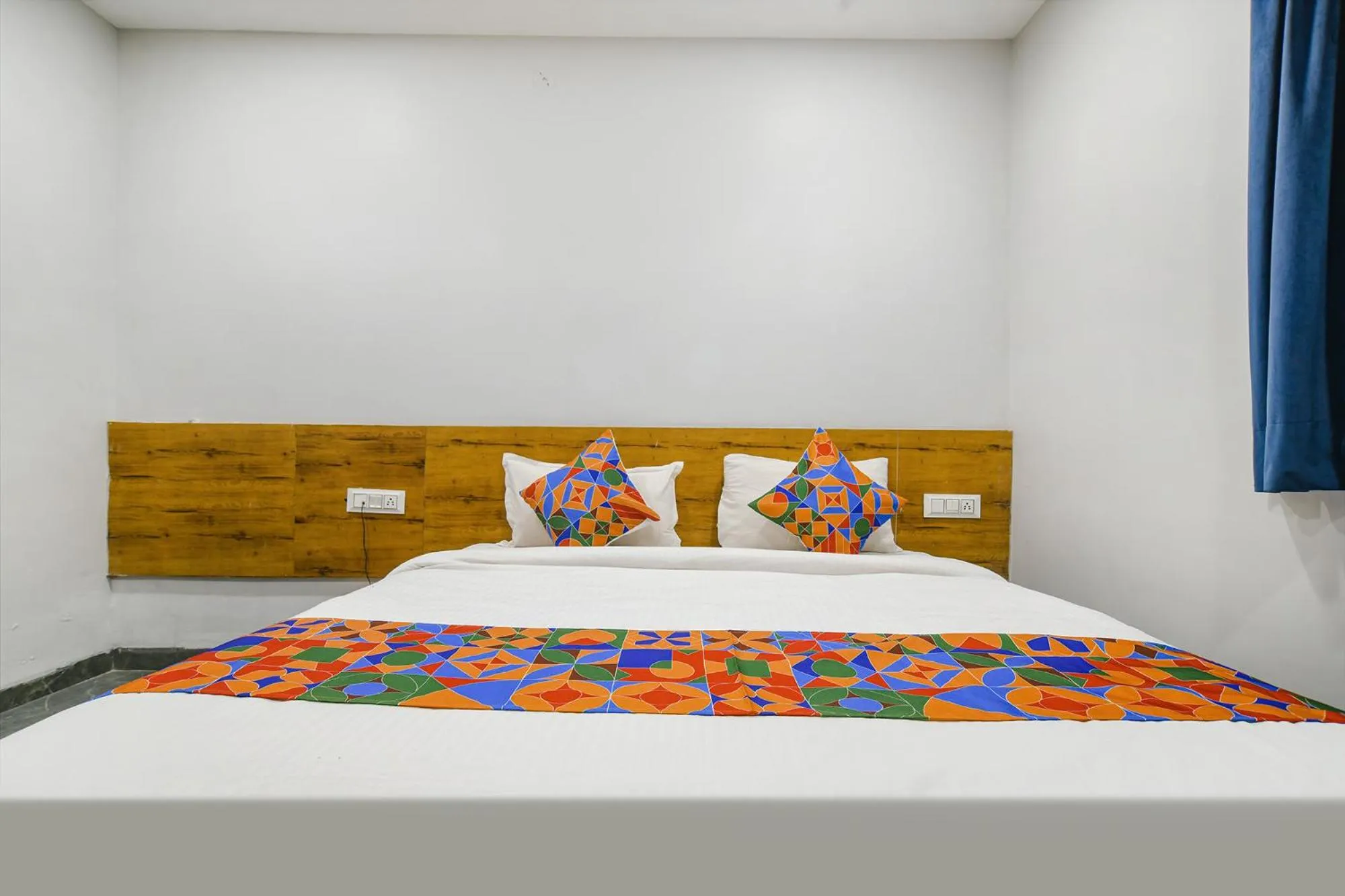 Bed in FabHotel Unity Landmark