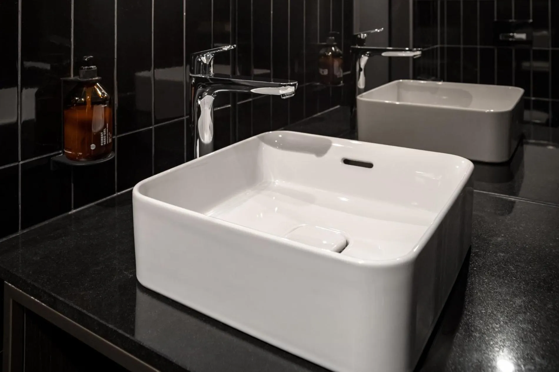 Bathroom in Hotel ROMY by AMANO