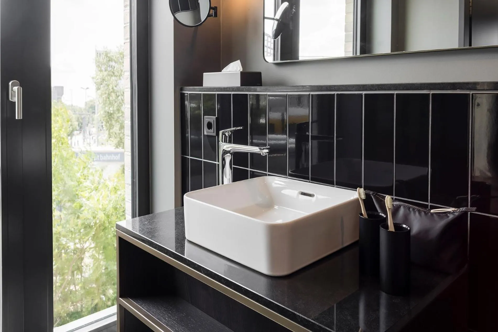 Bathroom in Hotel ROMY by AMANO