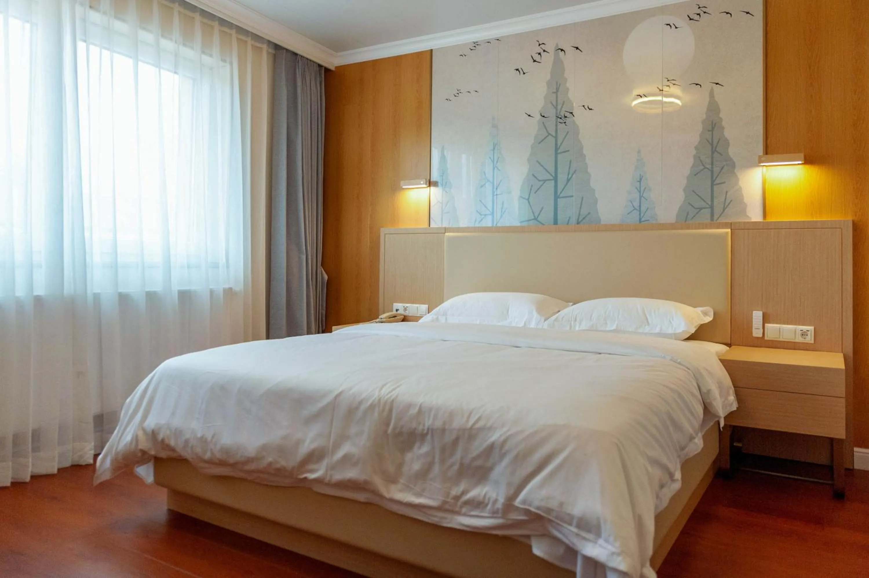 Bed in Mr.Liao Hotel