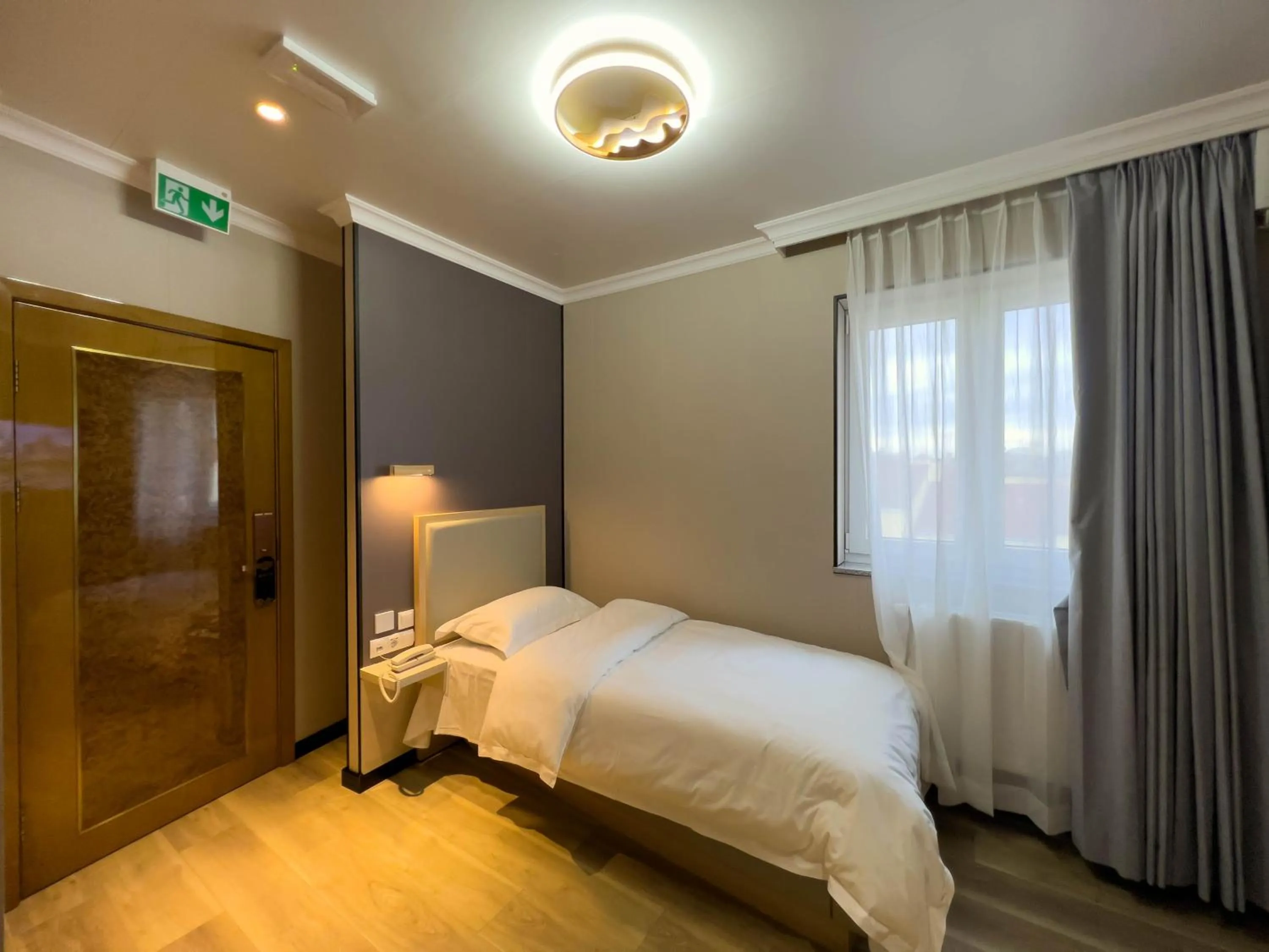 Bed in Mr.Liao Hotel