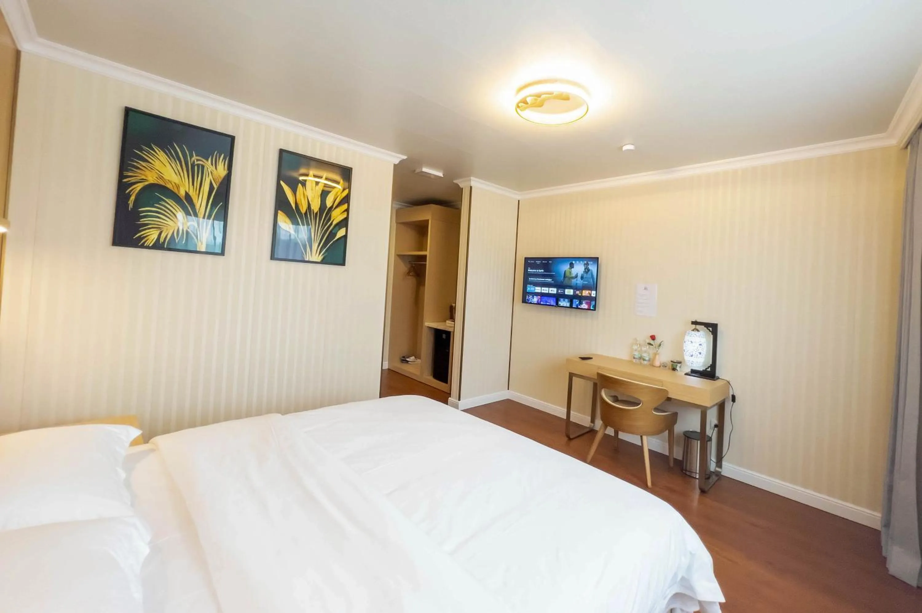 Bed in Mr.Liao Hotel