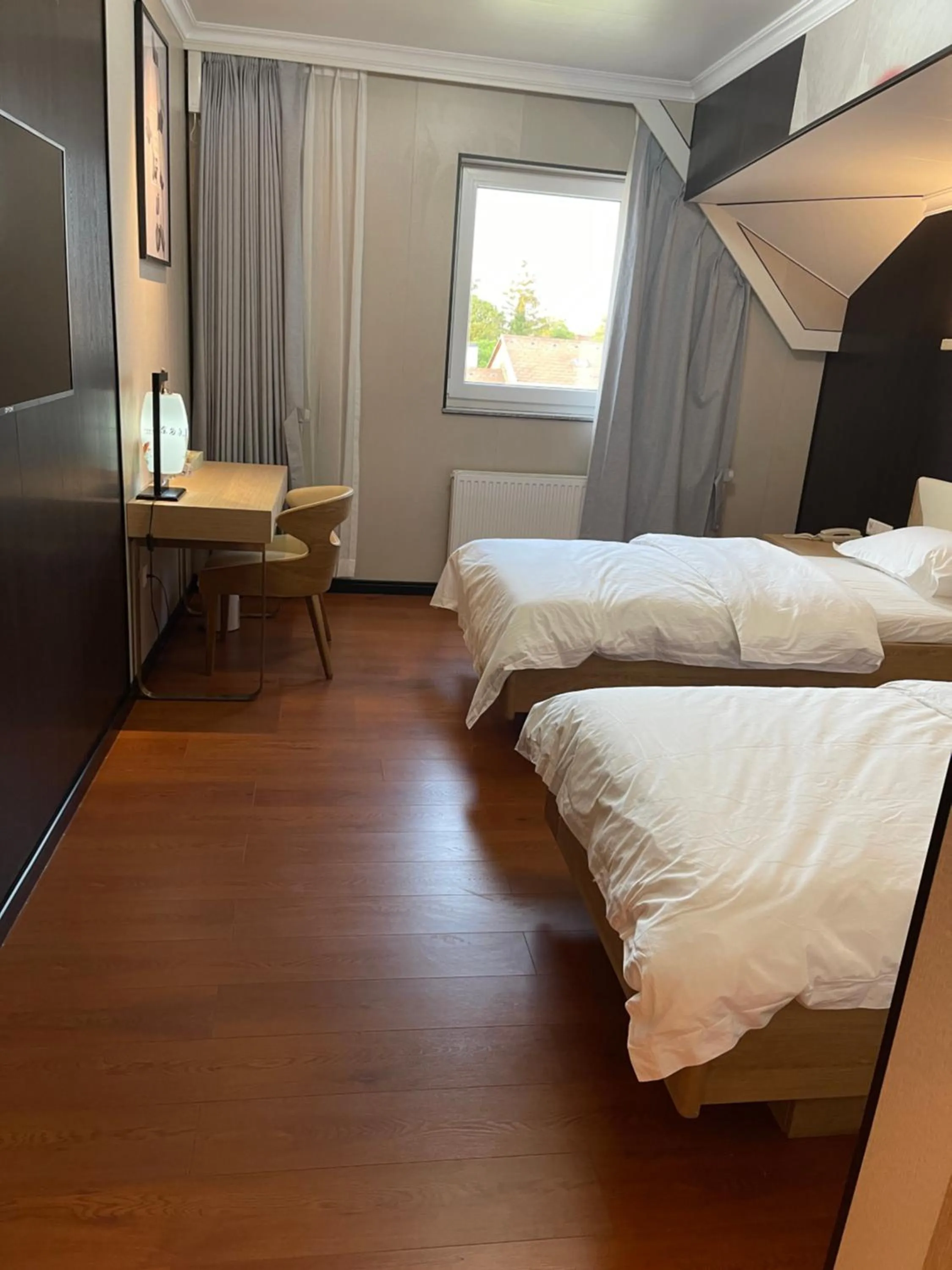 Bed in Mr.Liao Hotel