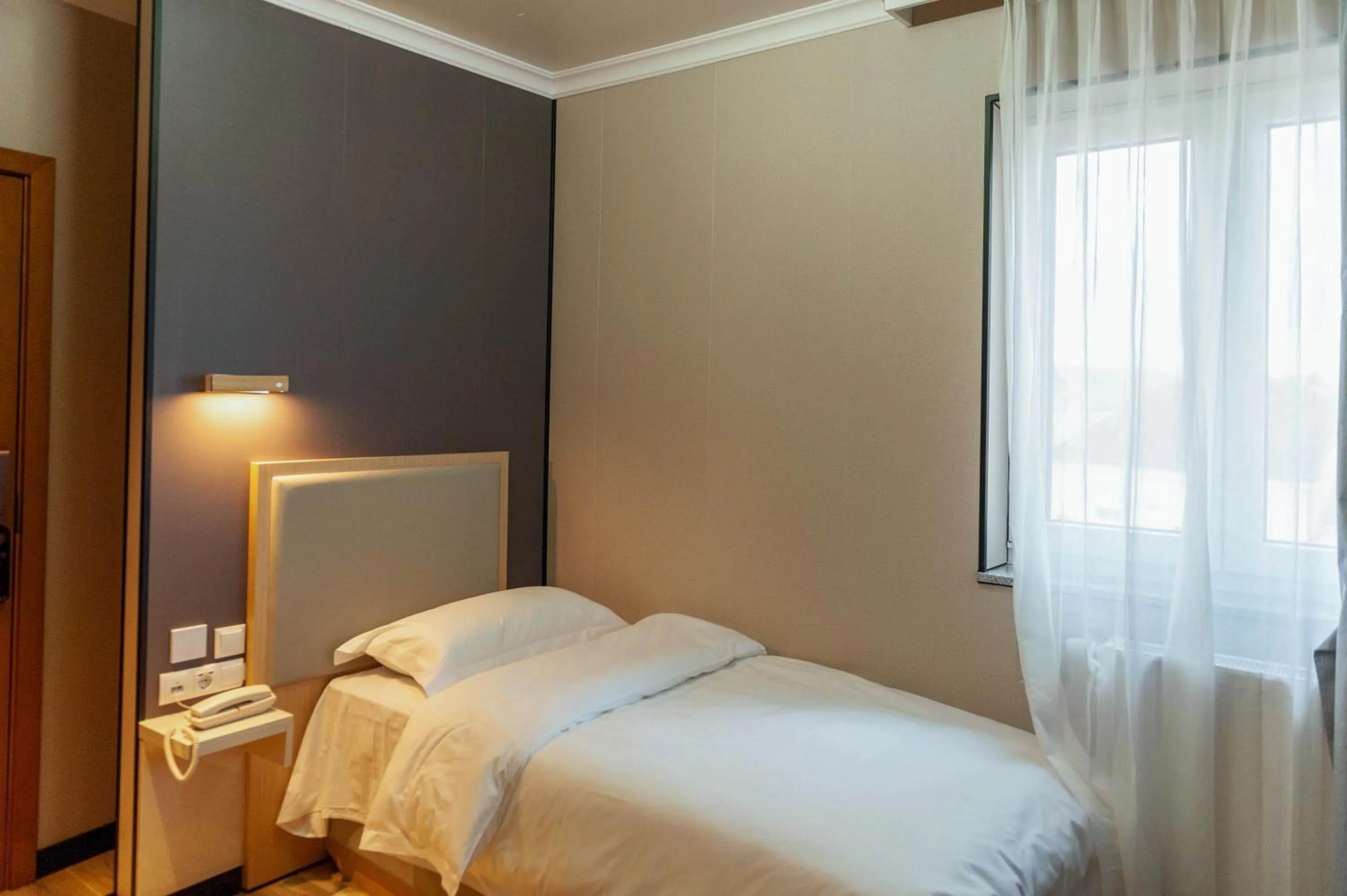 Bed in Mr.Liao Hotel