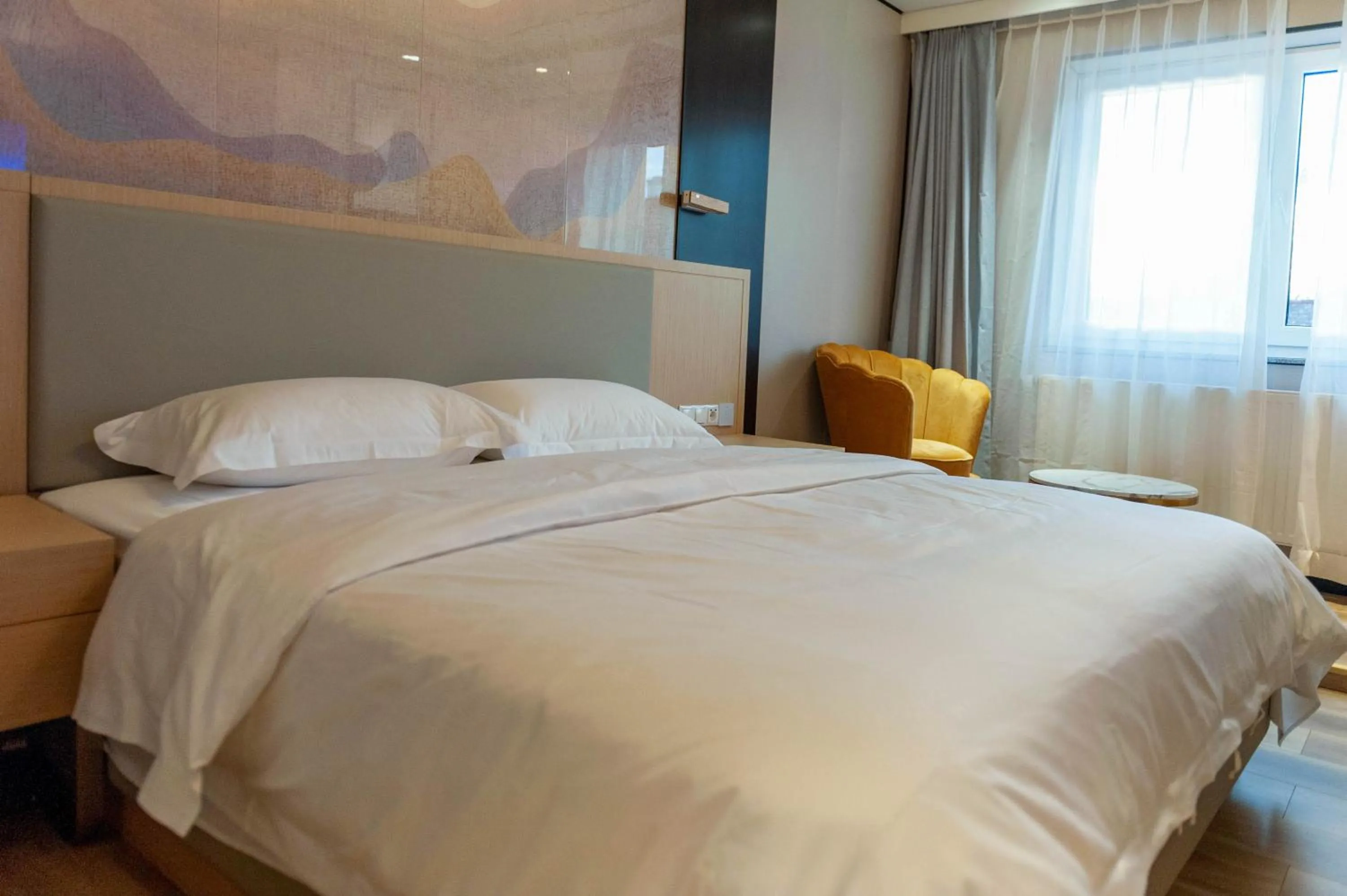 Bed in Mr.Liao Hotel