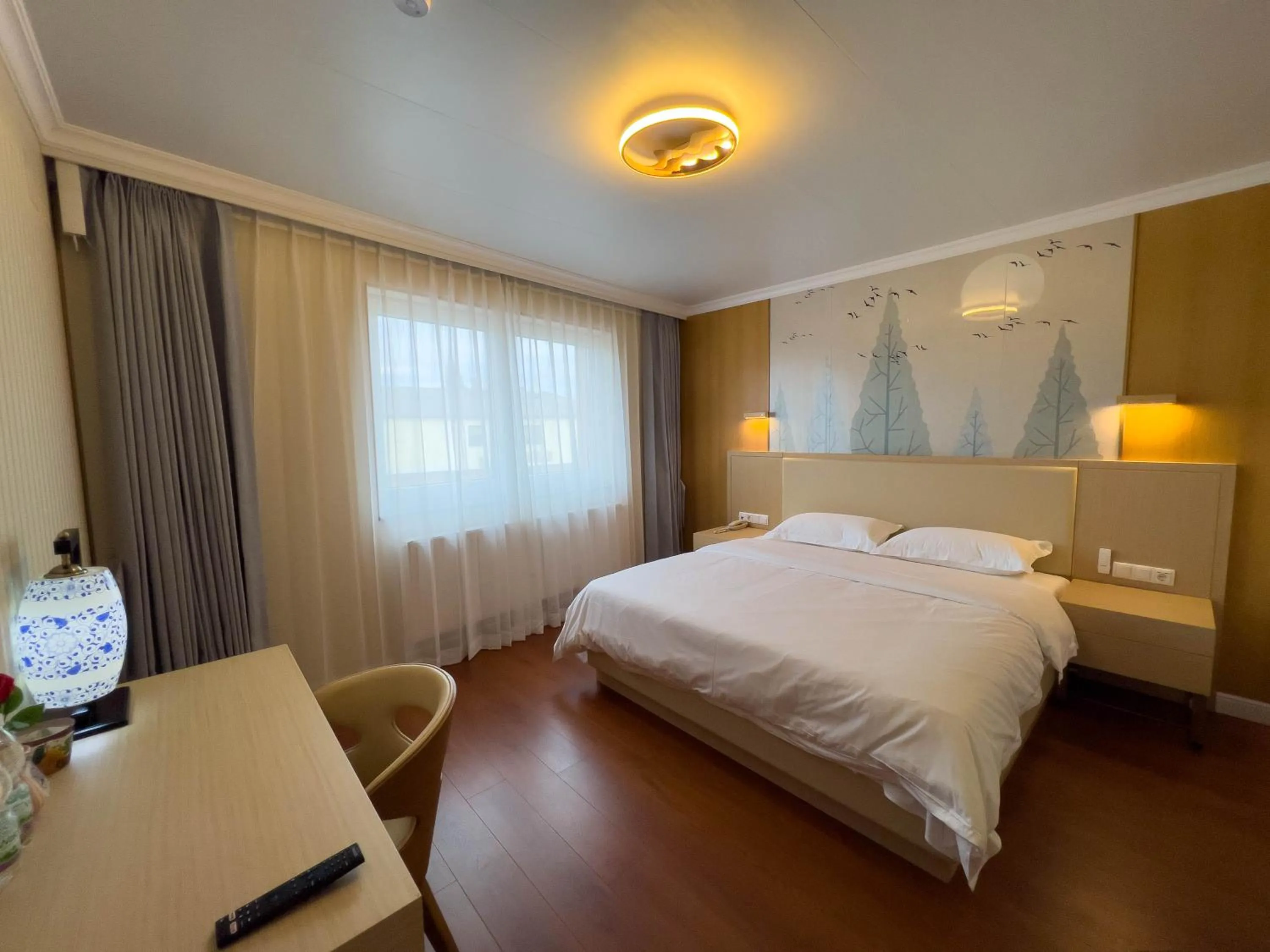 Bed in Mr.Liao Hotel