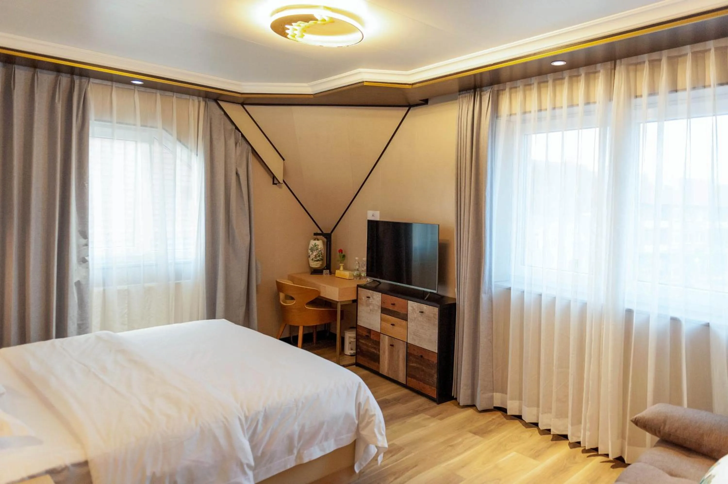 Bed in Mr.Liao Hotel