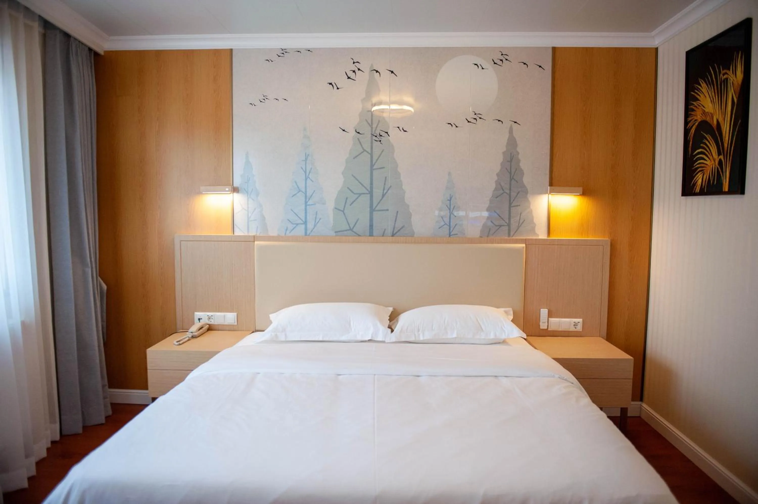 Bed in Mr.Liao Hotel