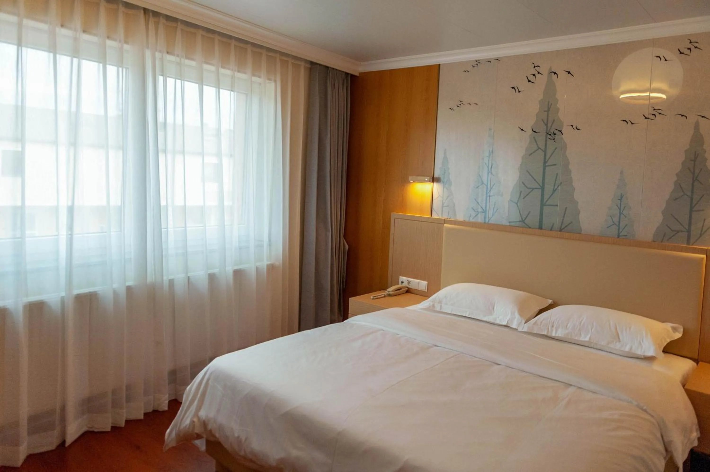 Bed in Mr.Liao Hotel