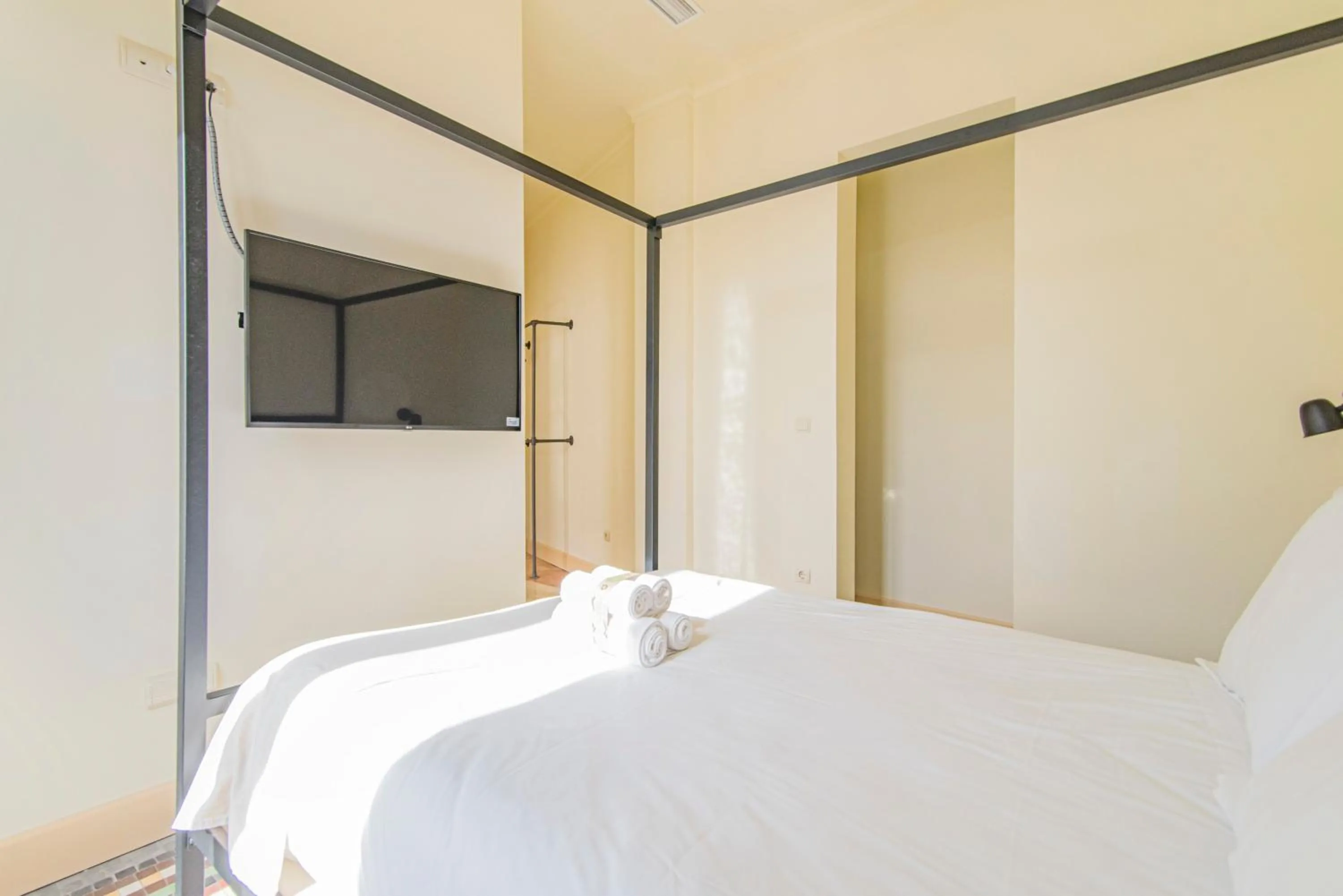 Bed in Mosaiko Homes Catedral Granada