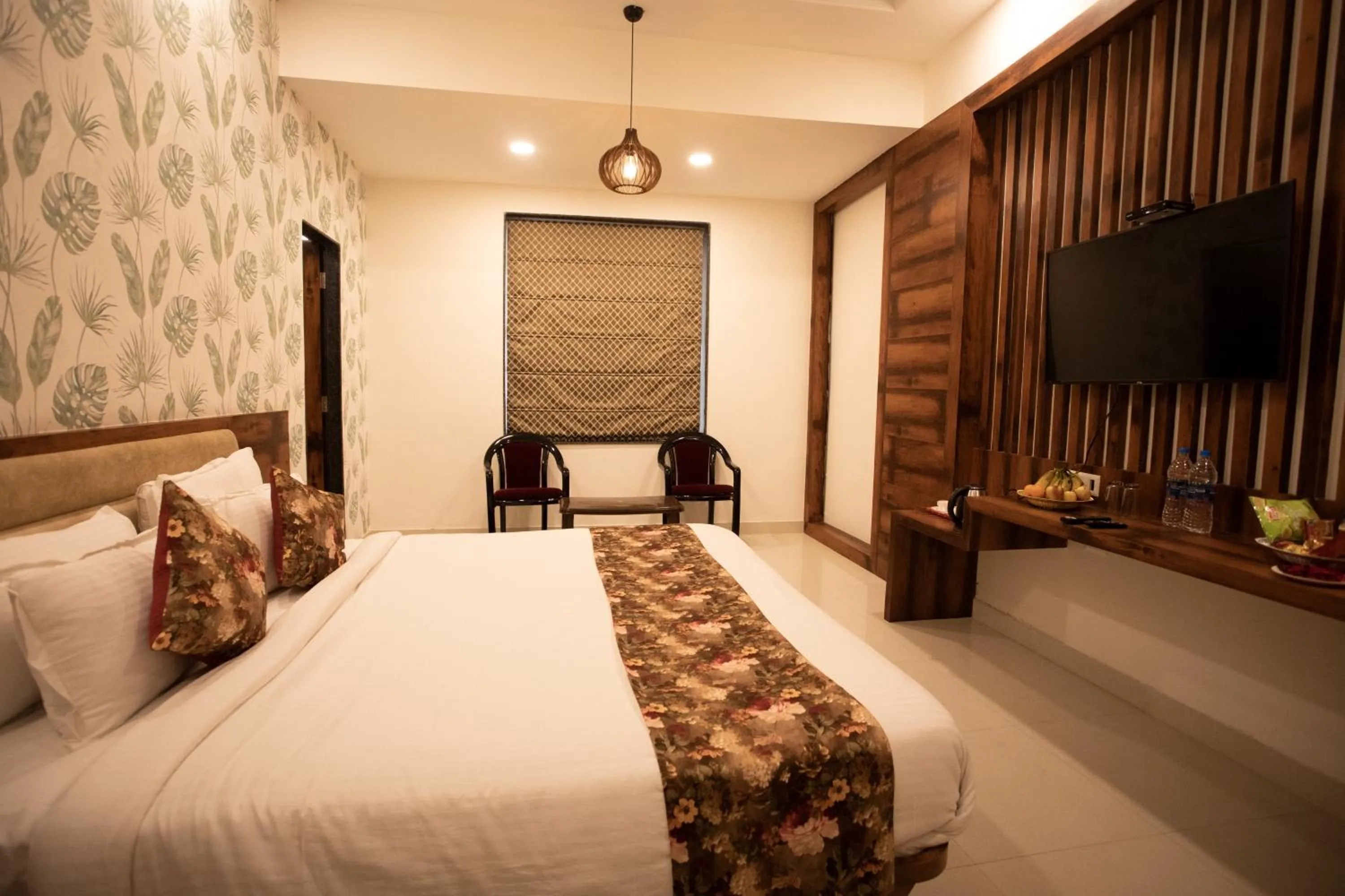 Photo of the whole room, Bed in Hotel Bhairav Bagh with Swimming Pool