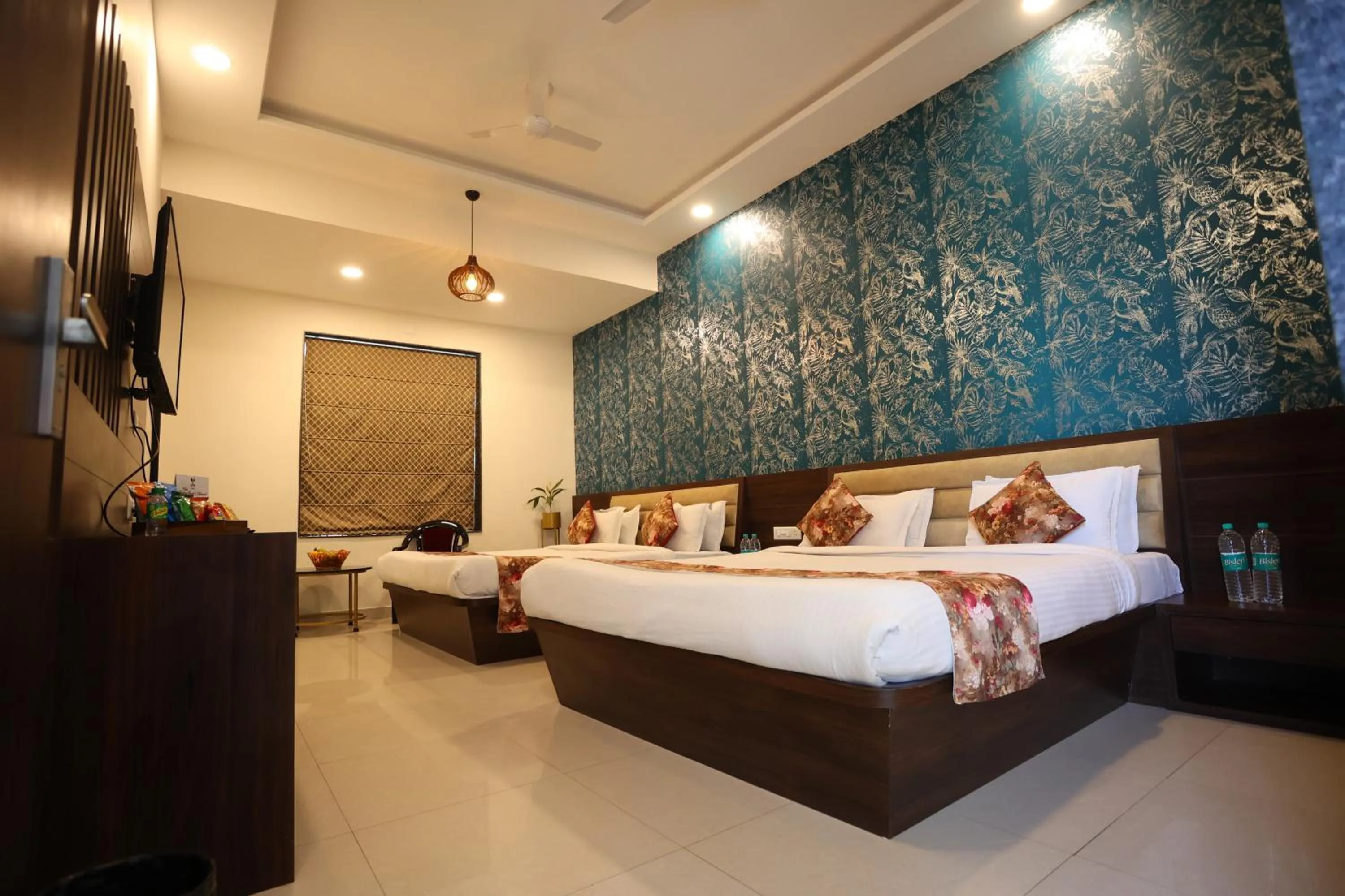 Bed in Hotel Bhairav Bagh with Swimming Pool