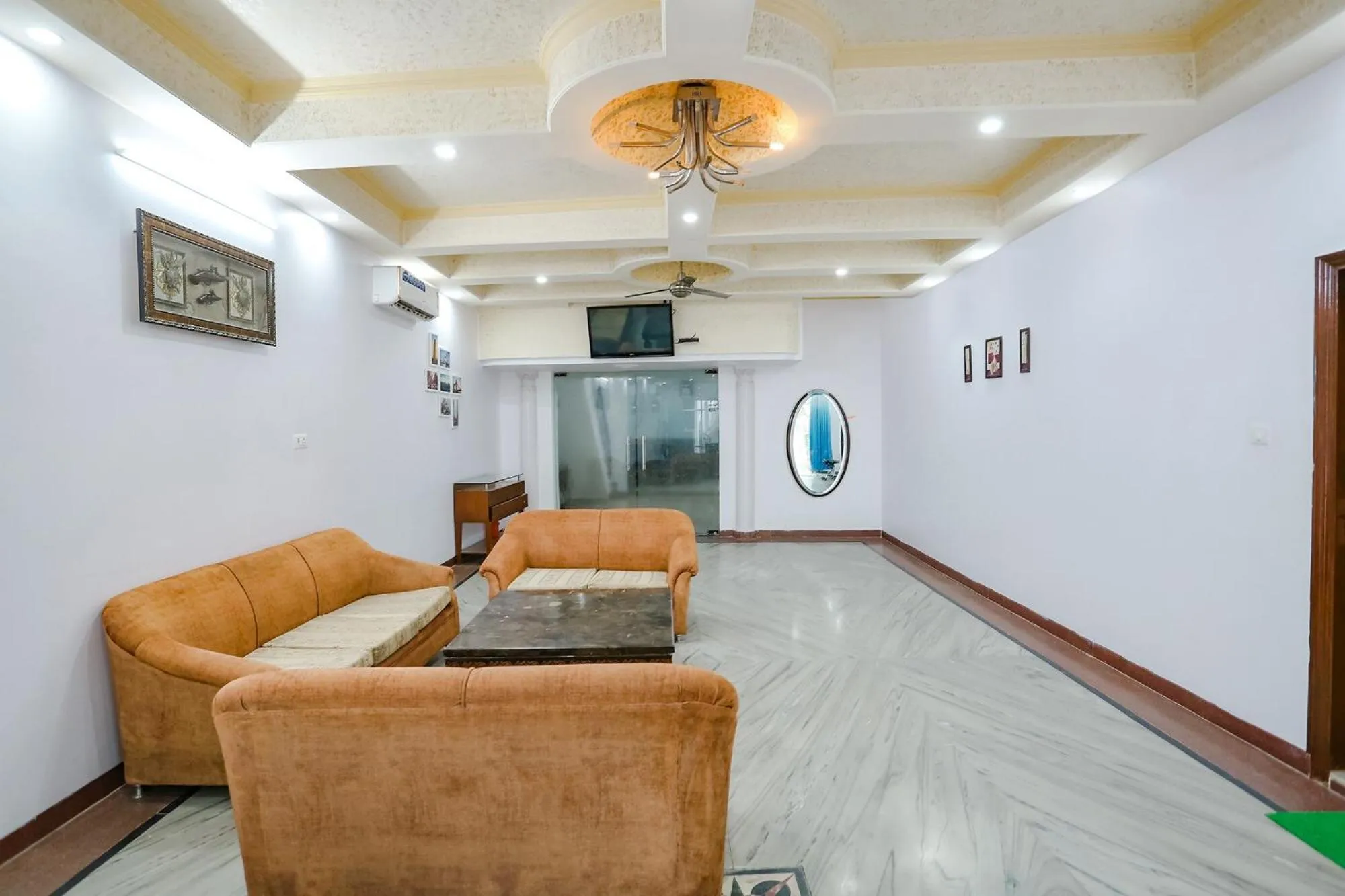 Seating area in FabHotel Premium Rooms - Nr Yashobhoomi Convention Centre