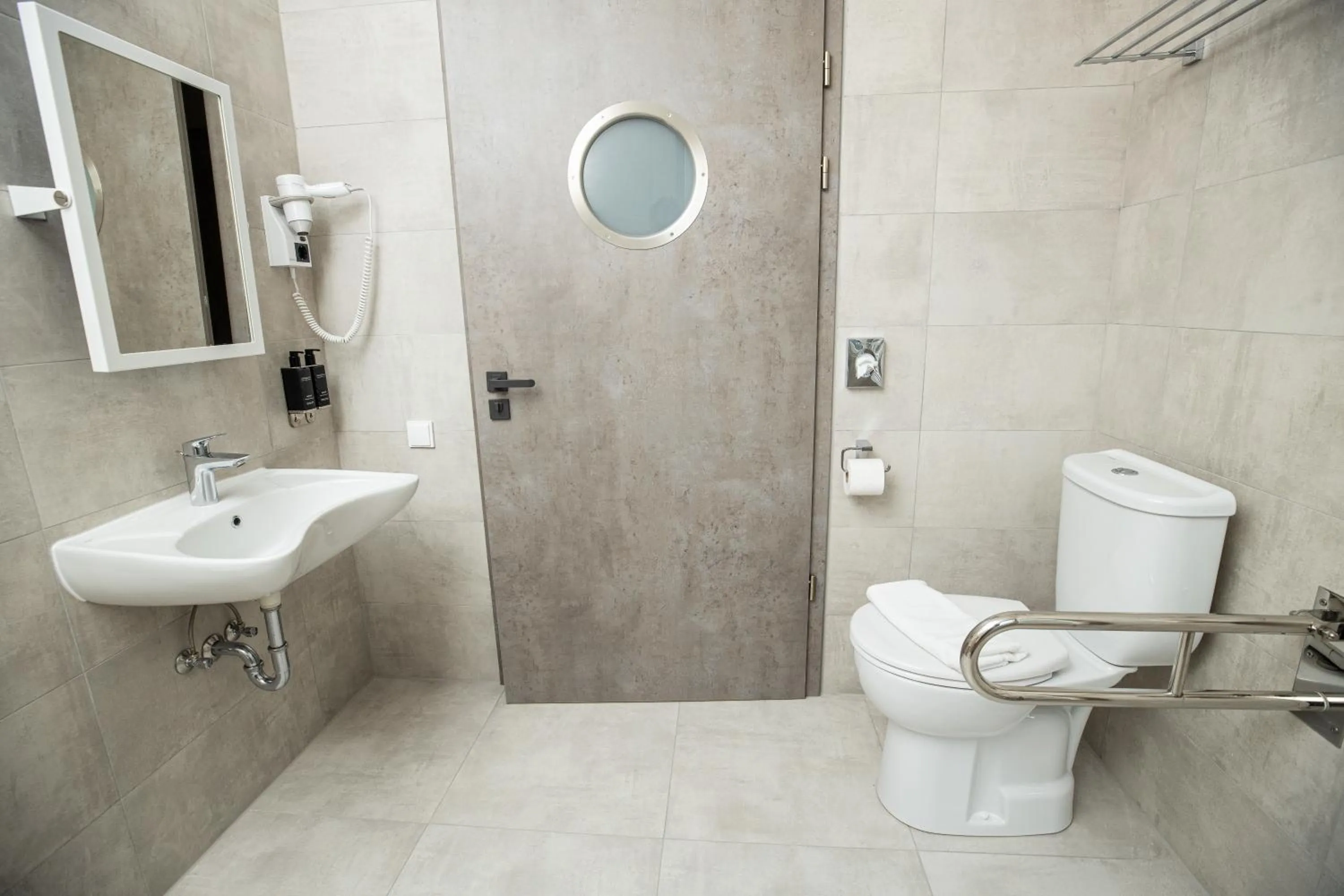 Bathroom in Arena Deluxe & Spa