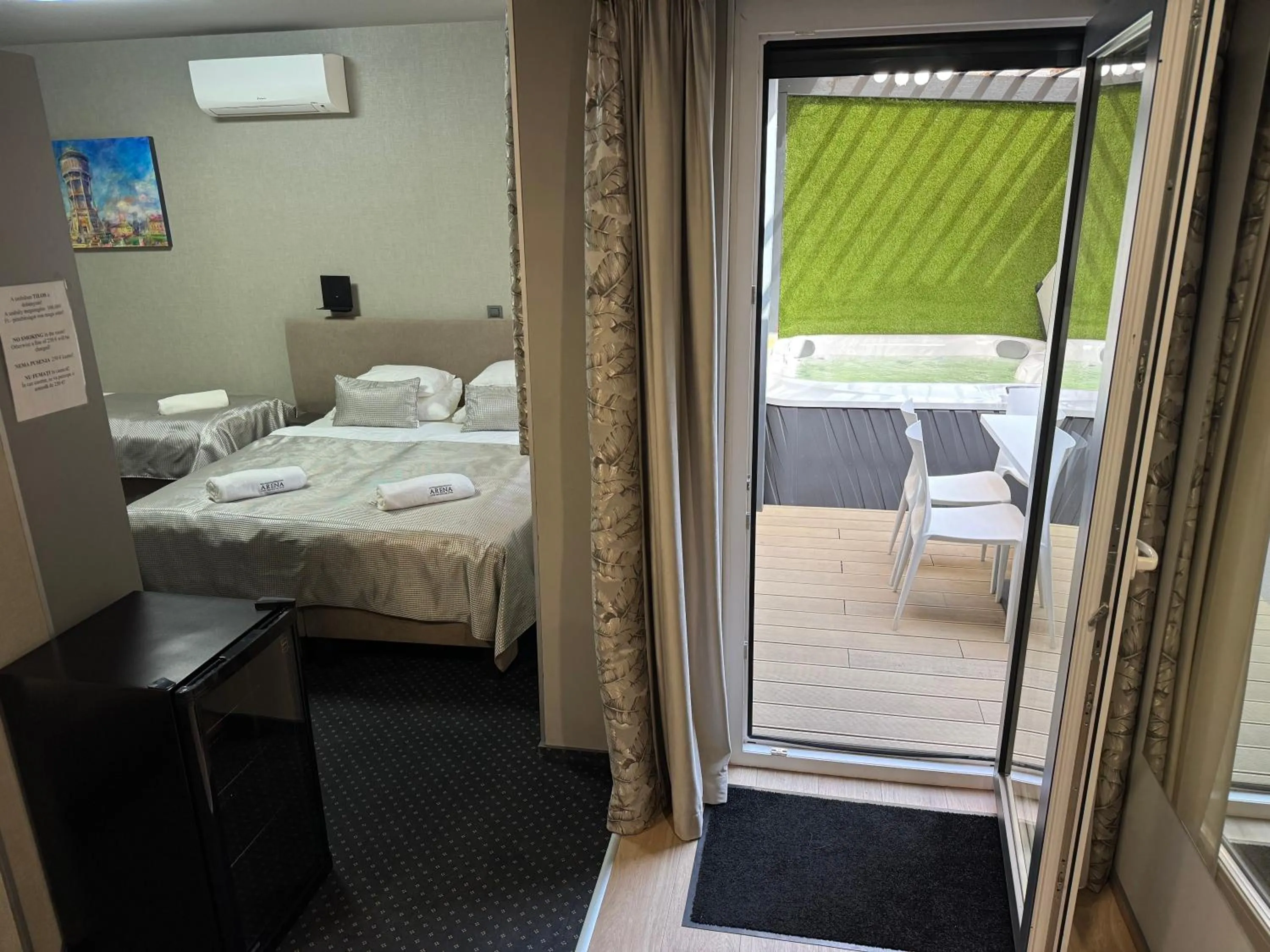 Swimming pool, Bed in Arena Deluxe & Spa