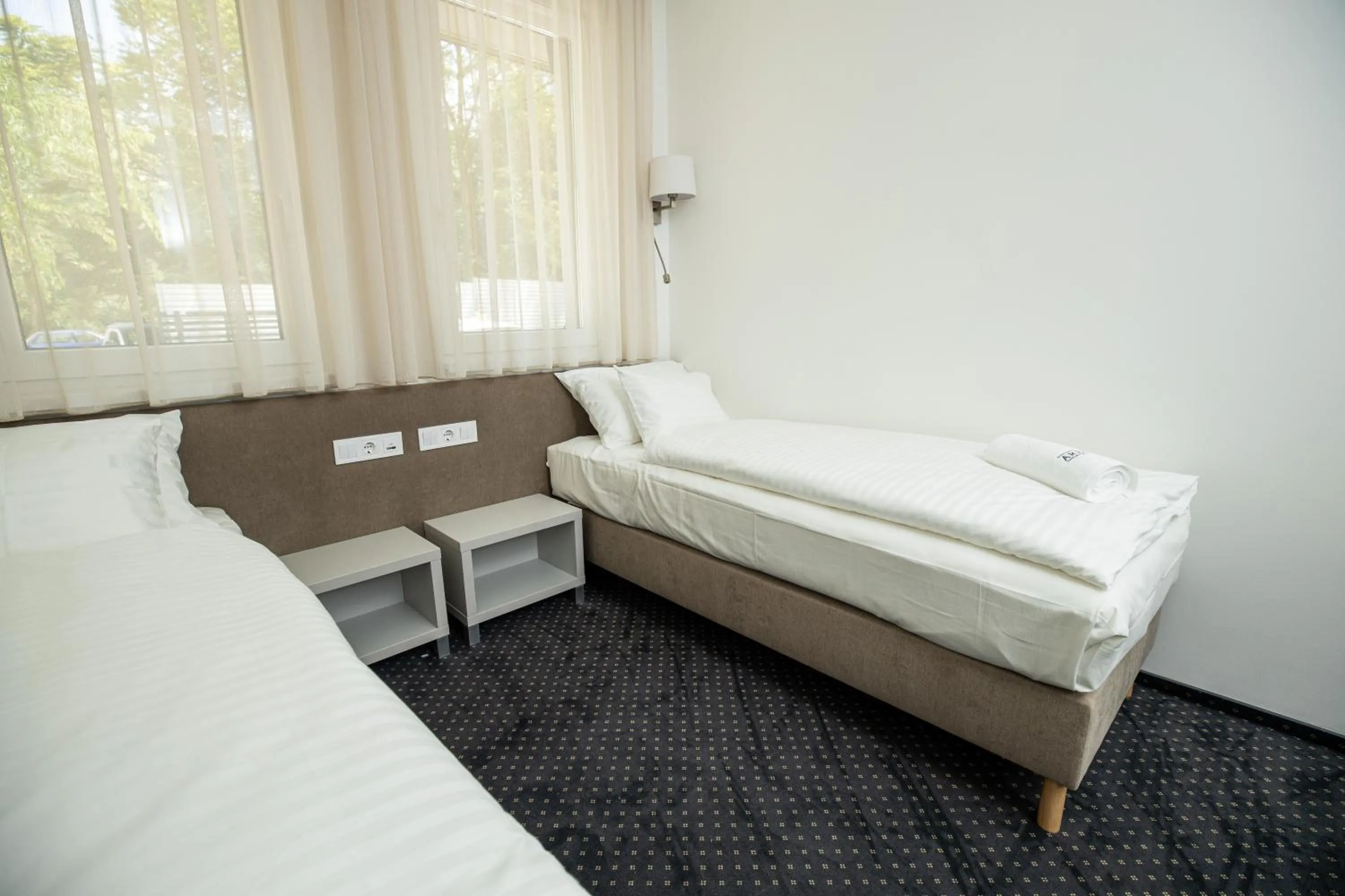 Bed in Arena Deluxe & Spa