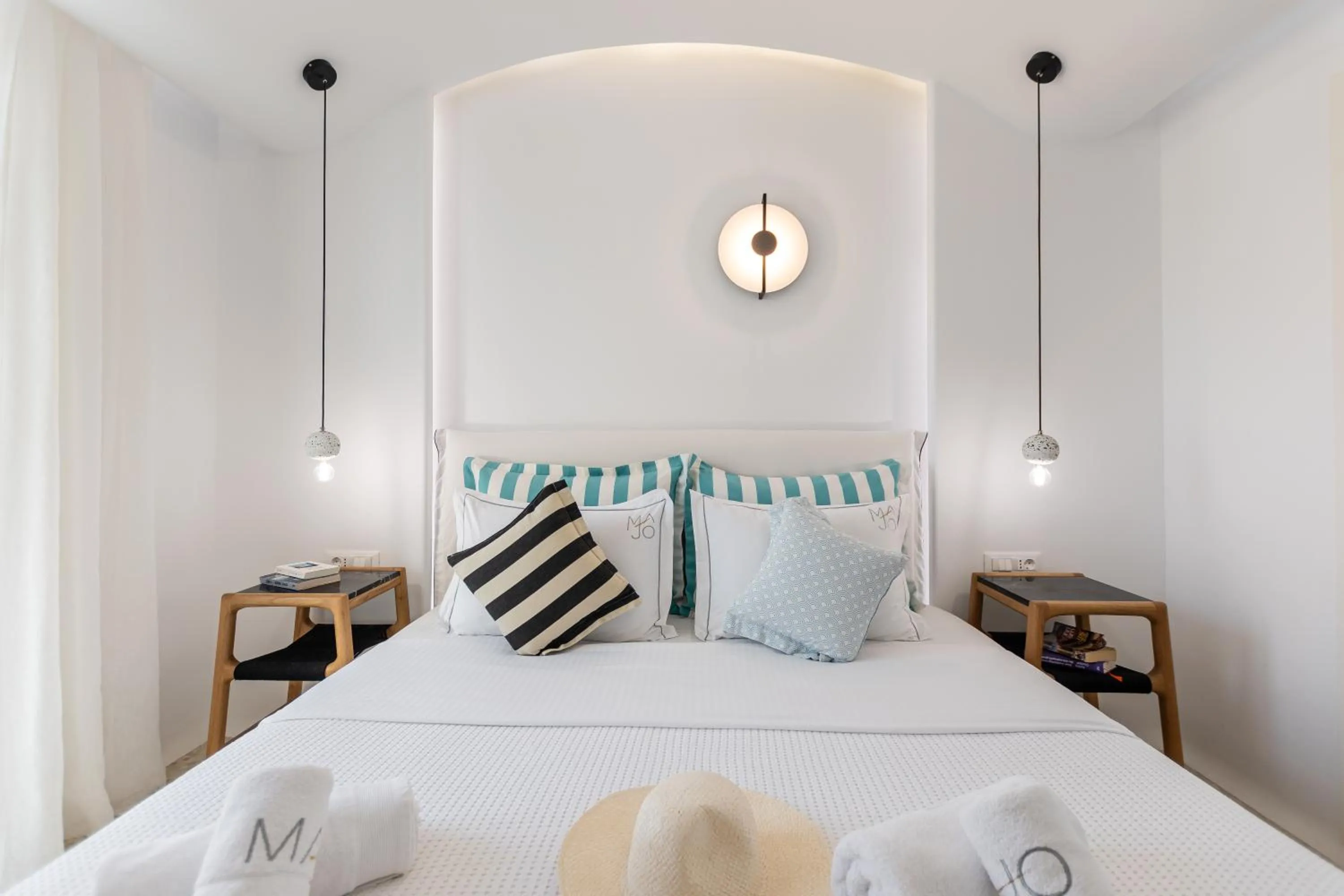 Patio, Bed in Majo Suites Hotel