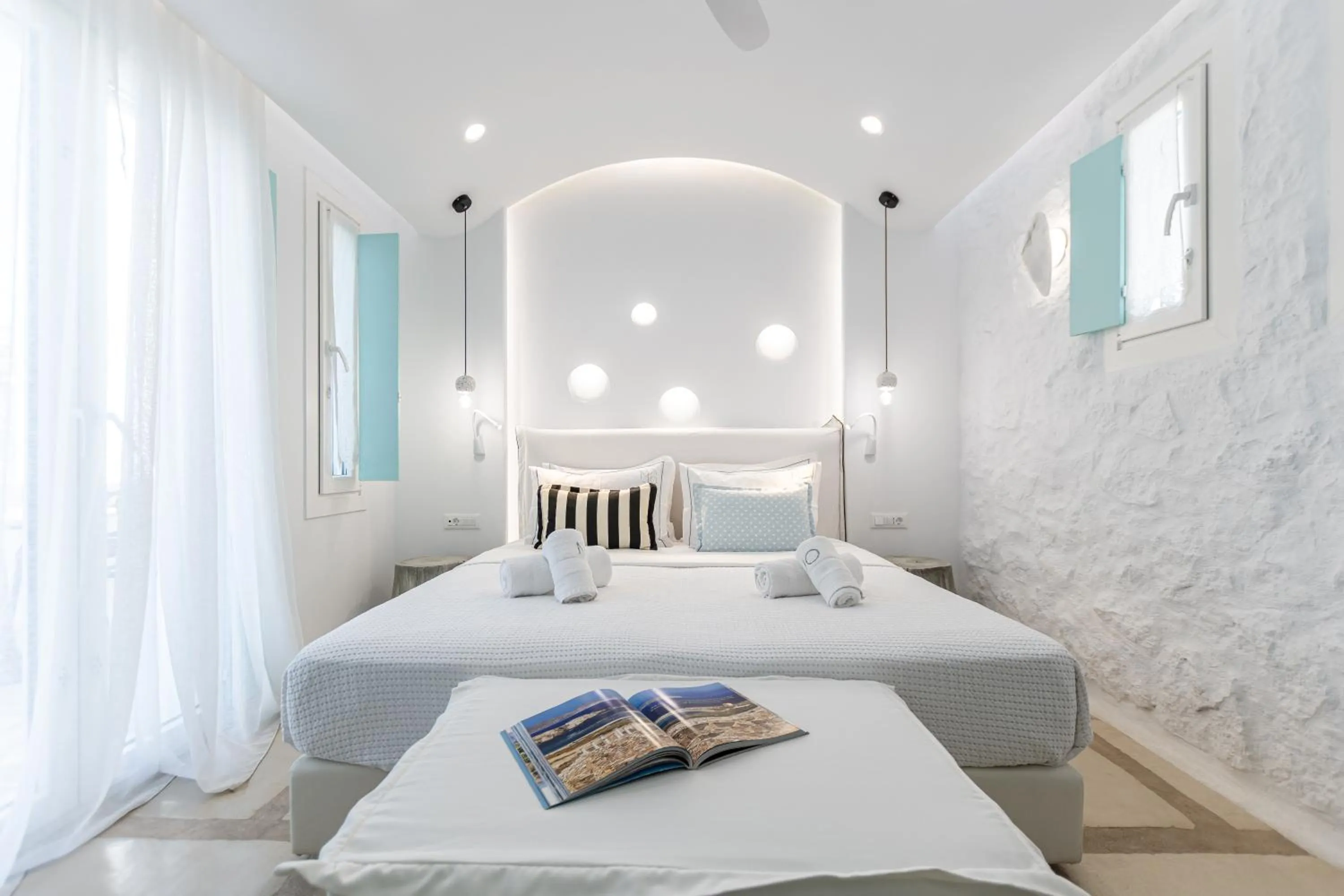 Patio, Bed in Majo Suites Hotel