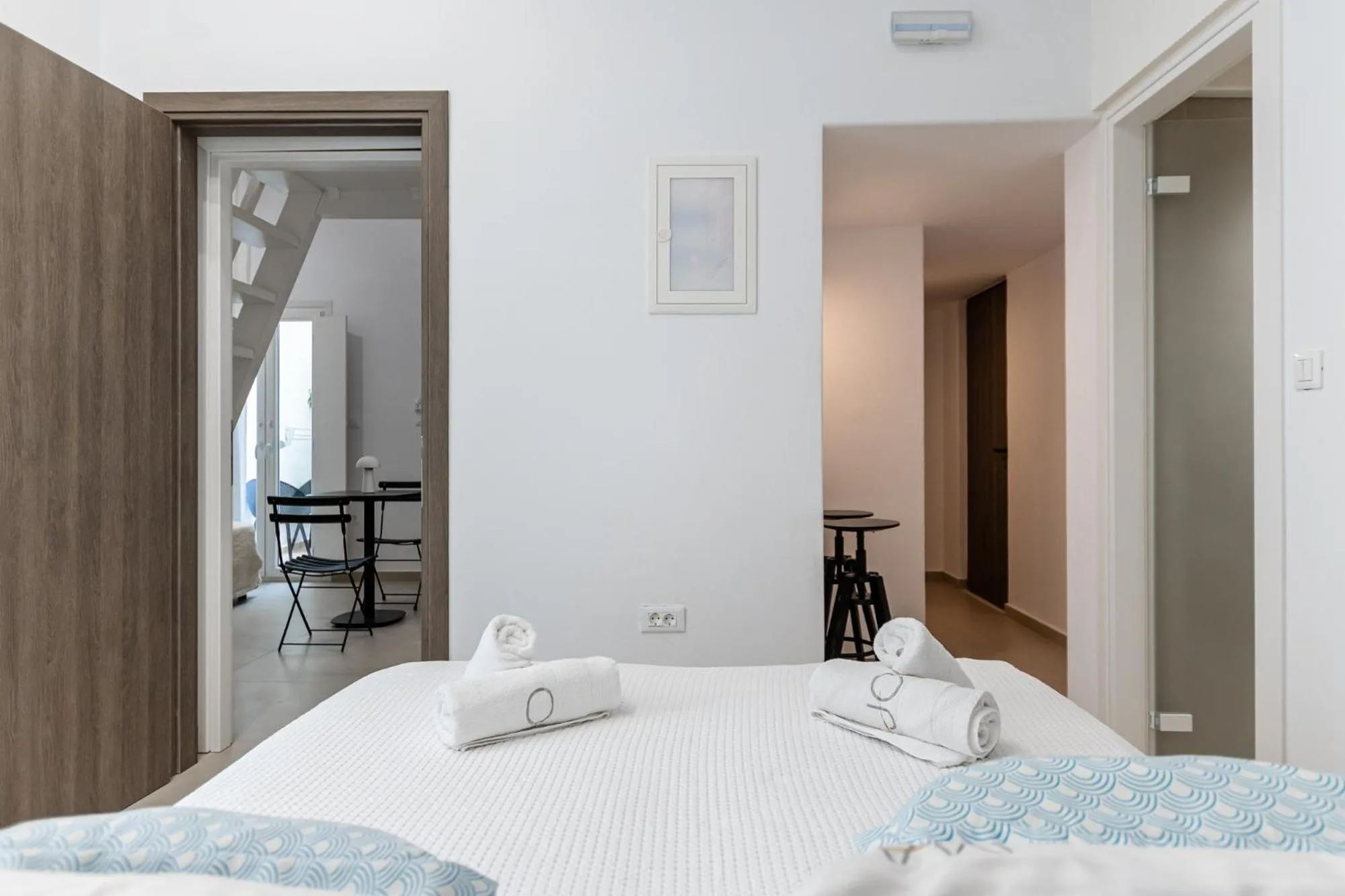 Bed in Majo Suites Hotel