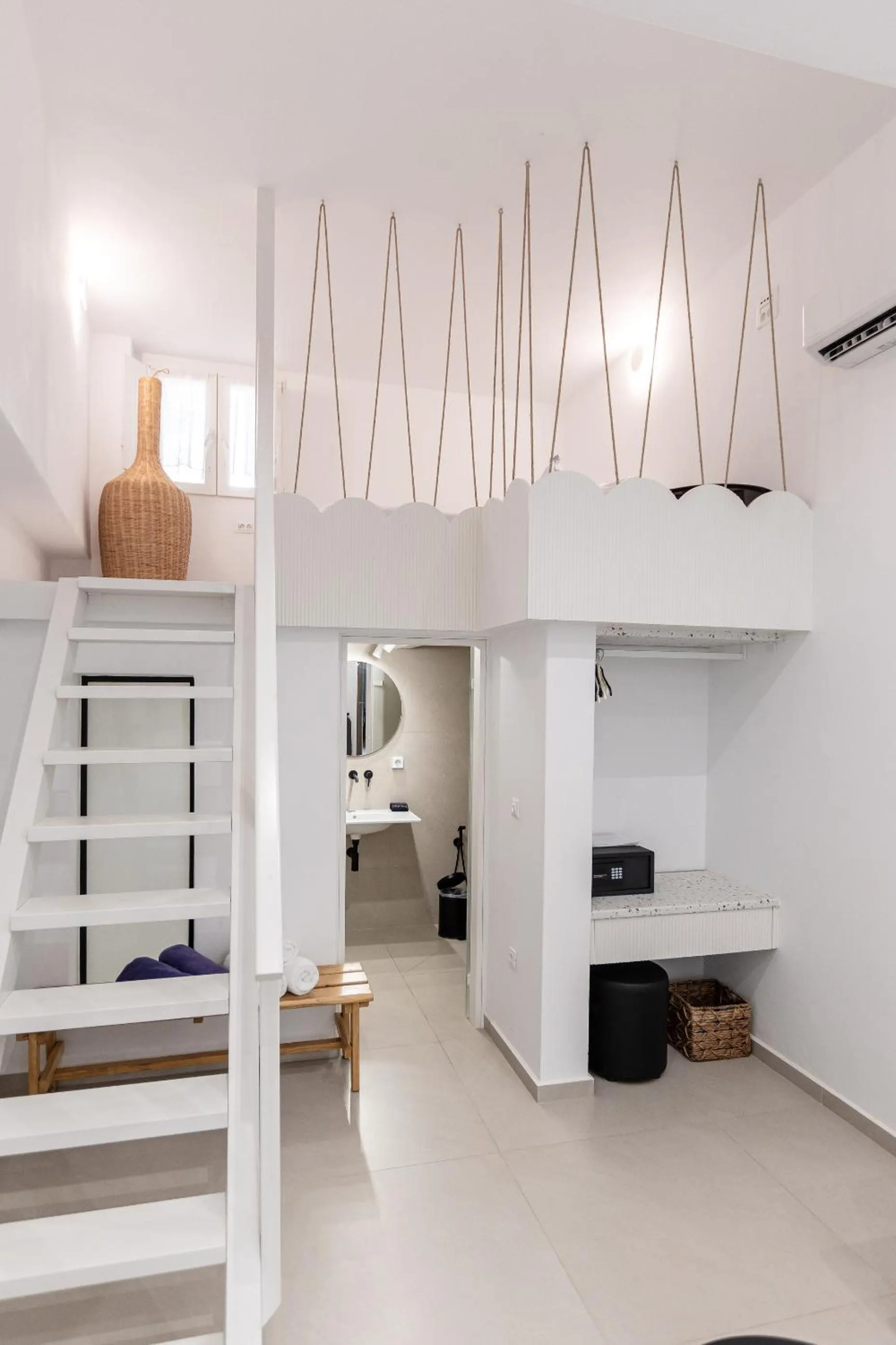 Bed in Majo Suites Hotel