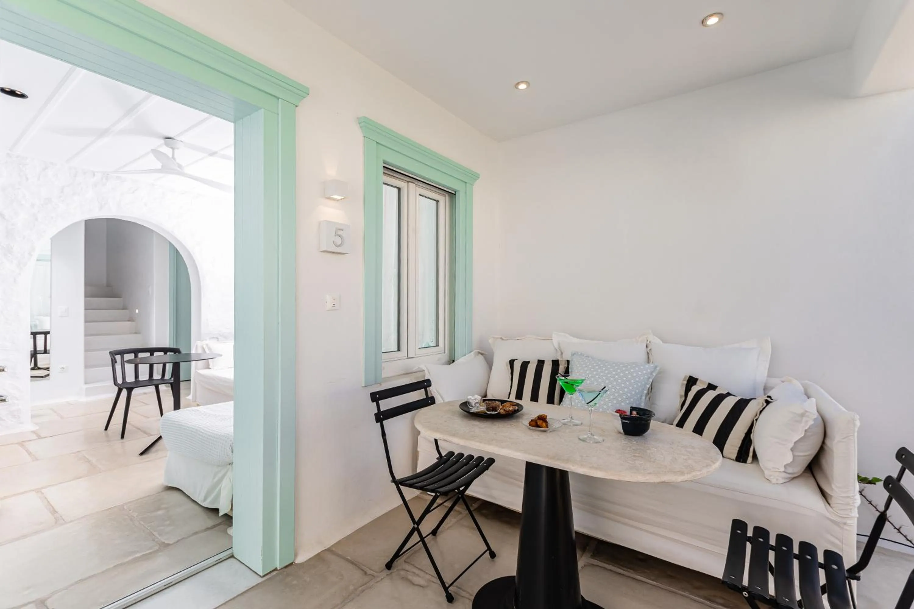 Staff, Bed in Majo Suites Hotel