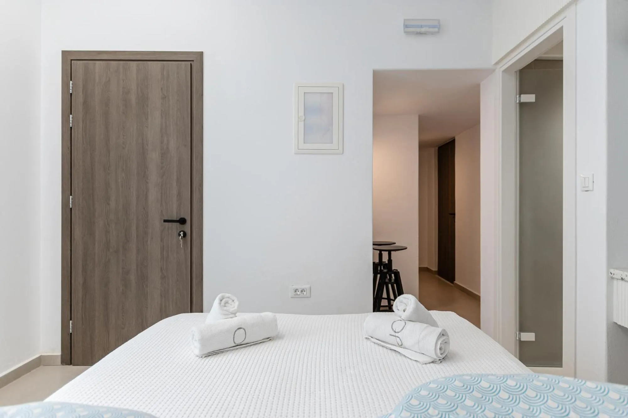 Bed in Majo Suites Hotel