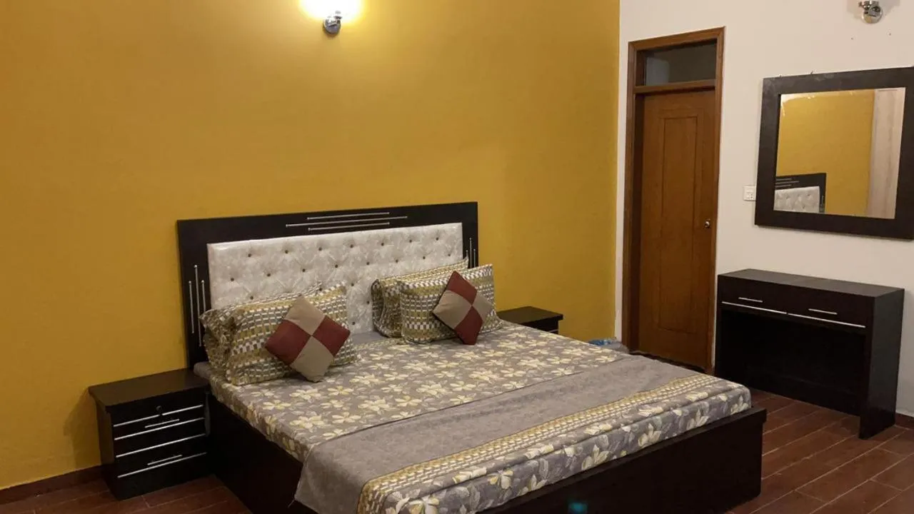 Bed in Hotel Executive Lodge