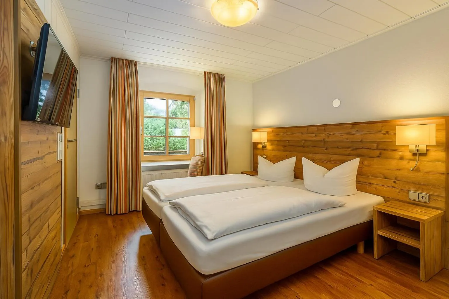 Photo of the whole room, Bed in Landgasthof Hotel Rebstock