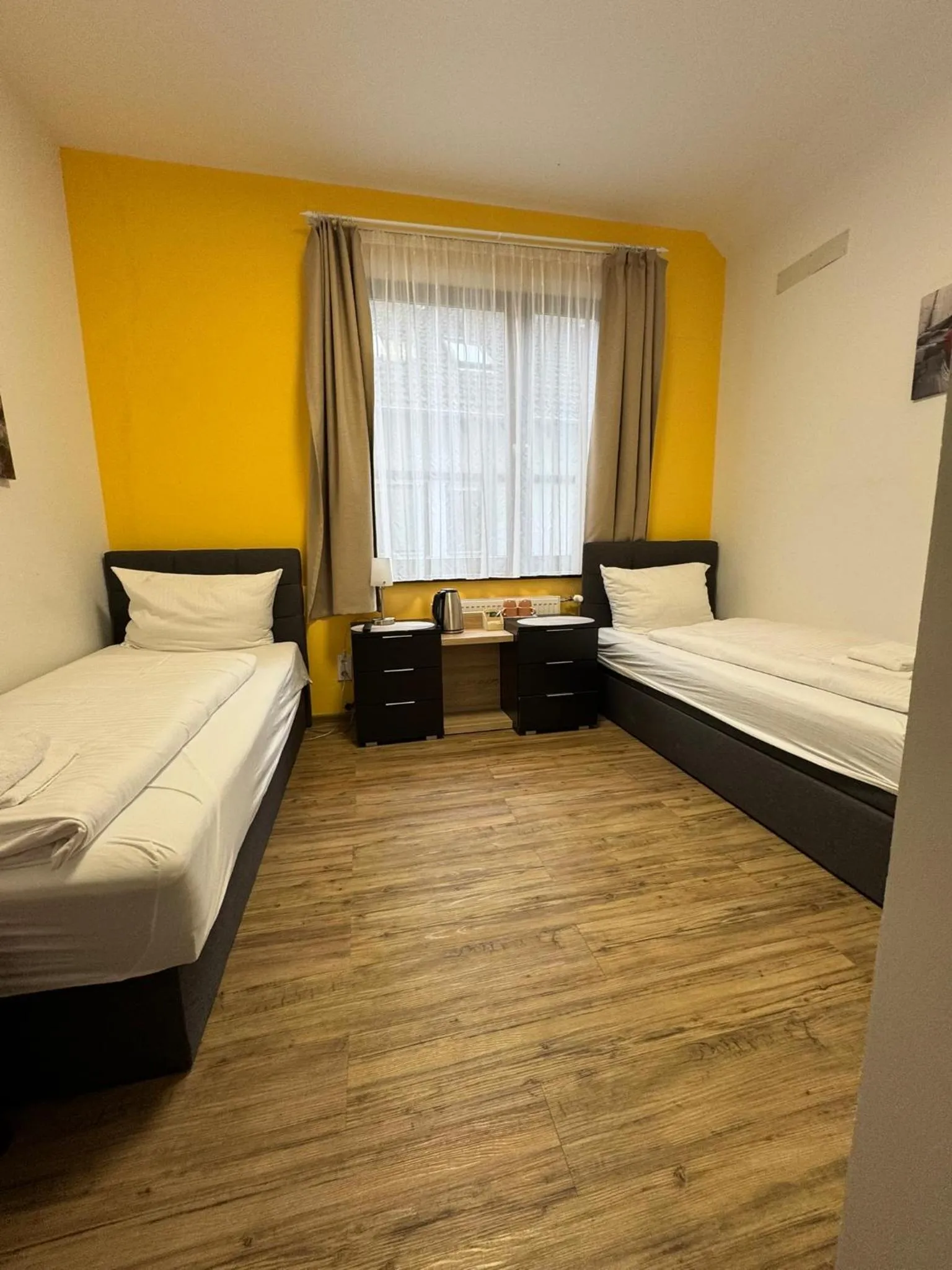 Bed in Hotel Grüner Baum - Melissone Italian Restaurant