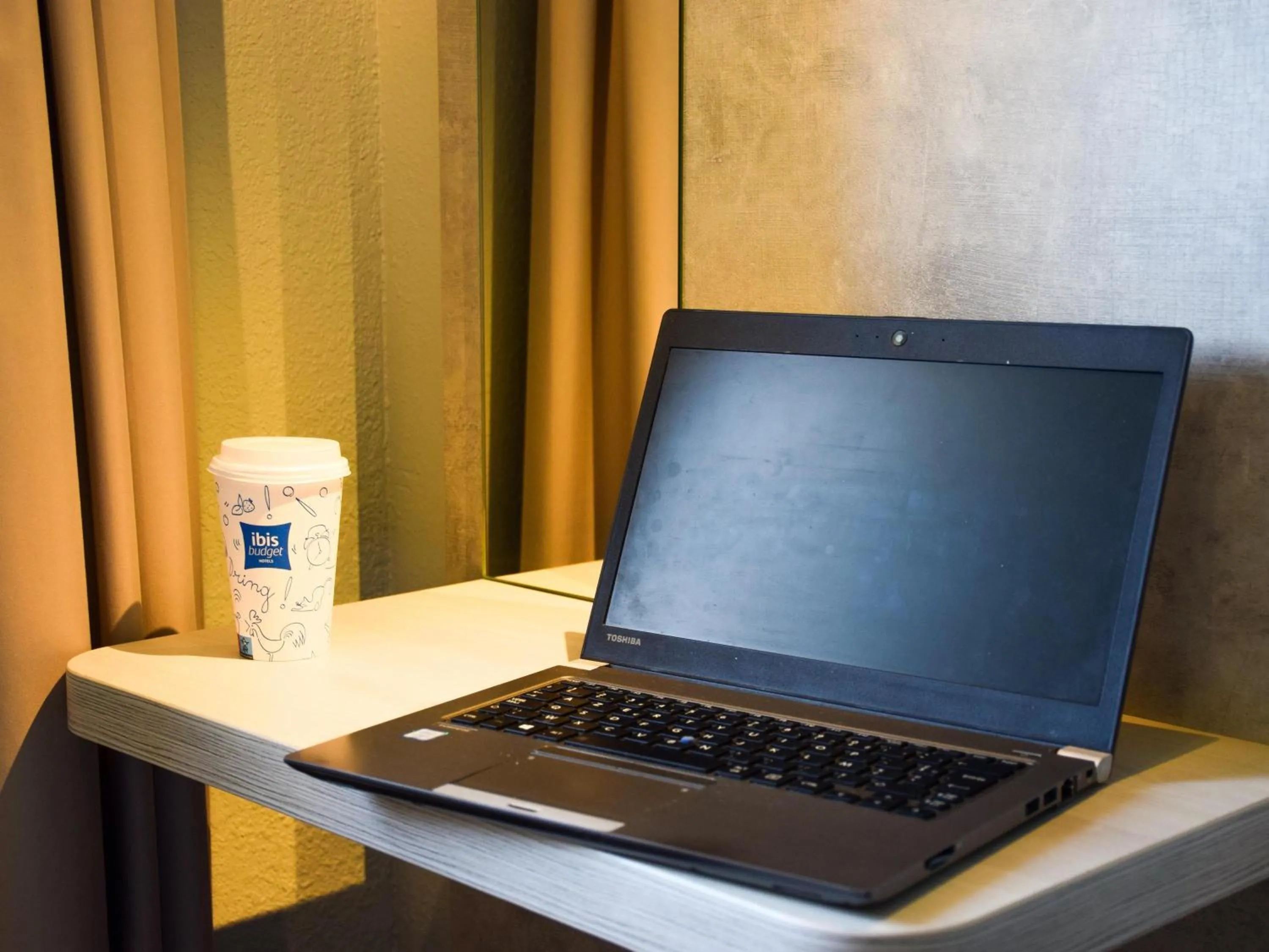 Bedroom in ibis Budget Millau Viaduc