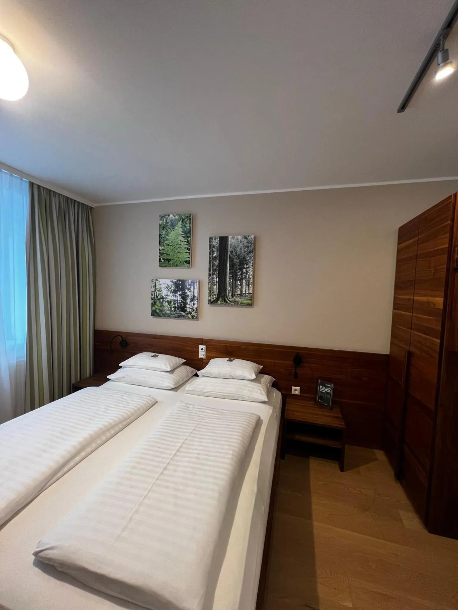 Bed in H+ Hotel Ried